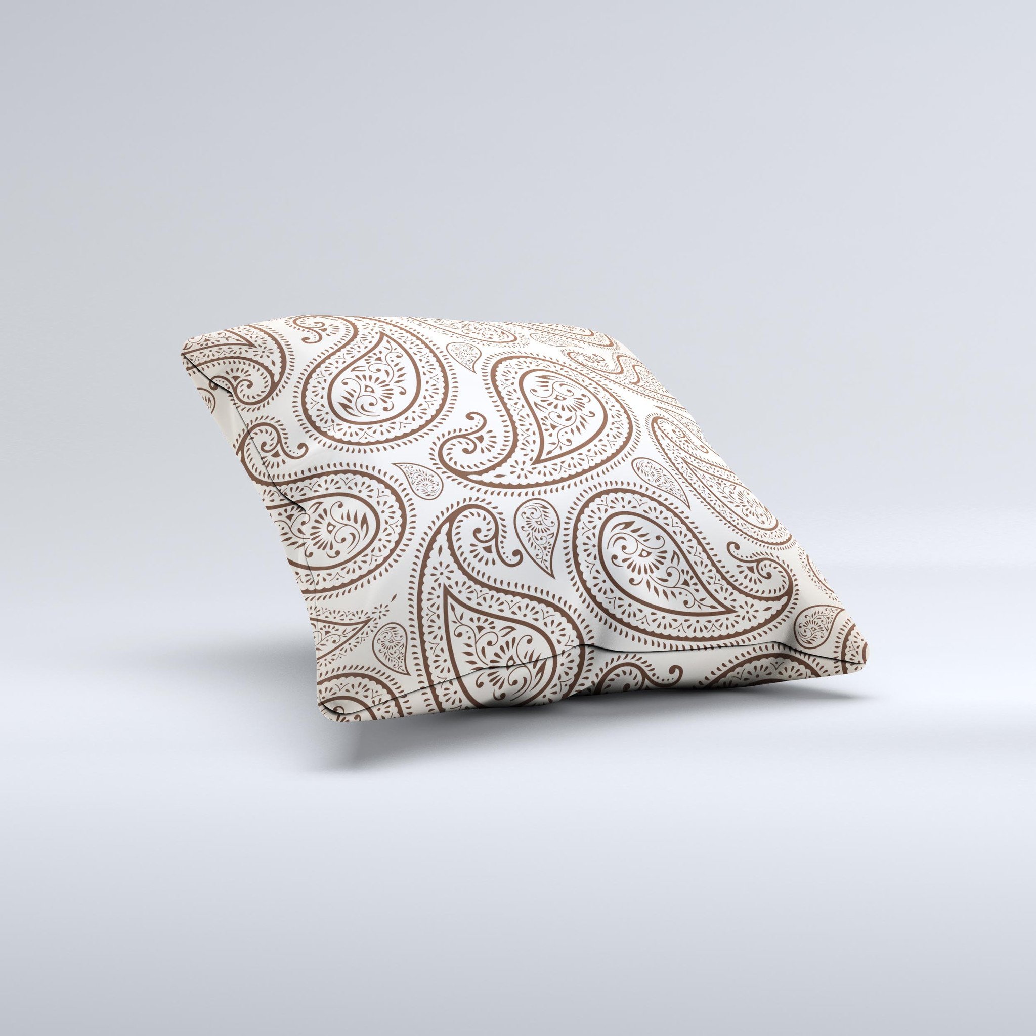 Tan highlighted paisley pattern decorative throw pillow, handcrafted with high thread count fabric and polyester filling.