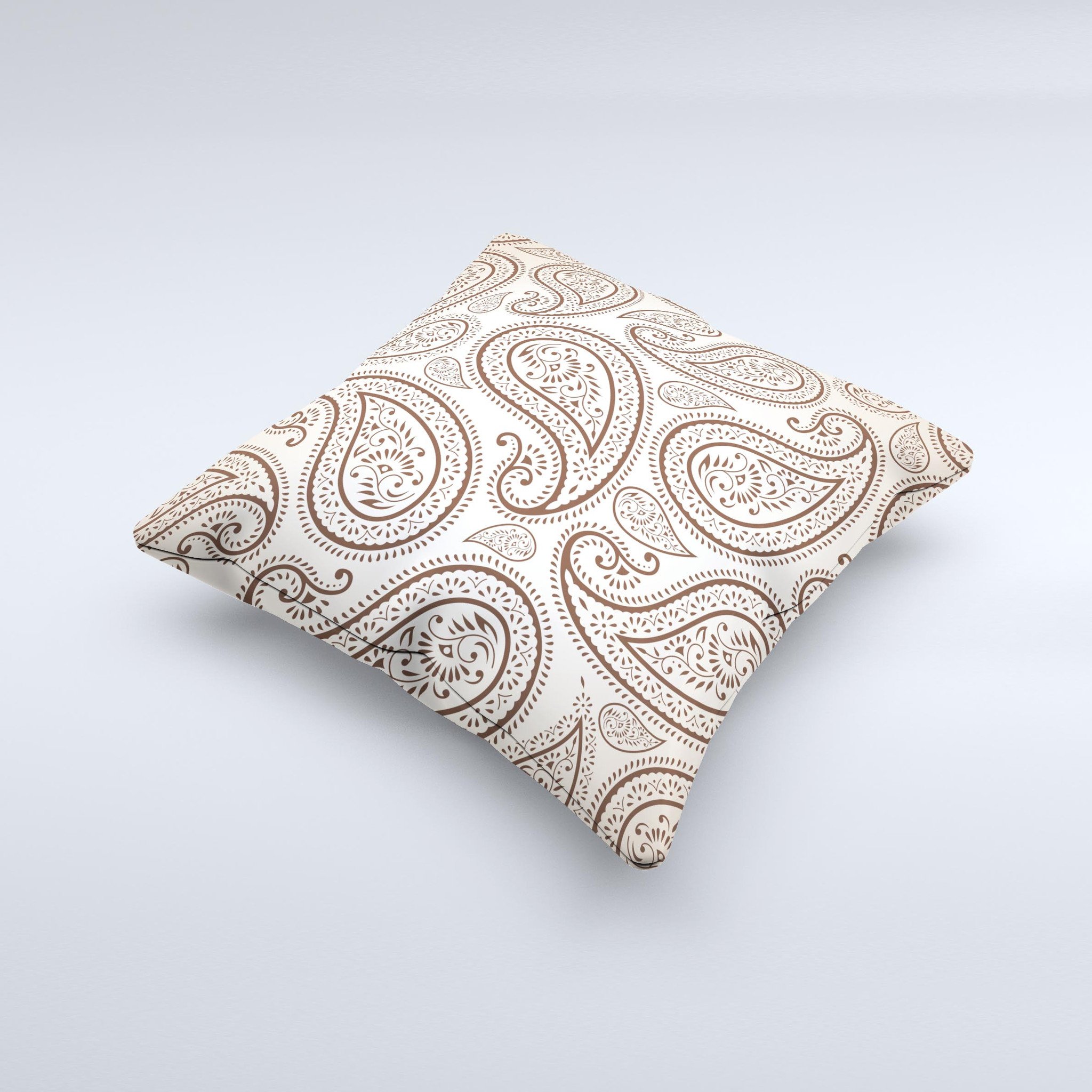 Tan highlighted paisley pattern decorative throw pillow, handcrafted with high thread count fabric and polyester filling.