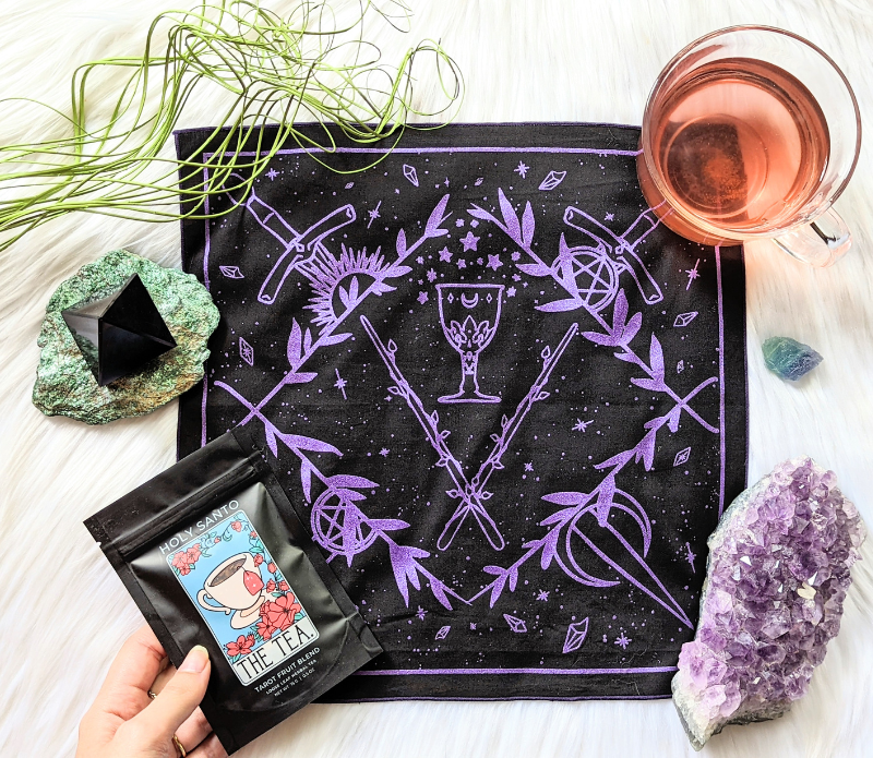 Tarot Altar Cloth featuring original artwork of the four tarot suits, made from eco-friendly materials, measuring 12x12 inches.