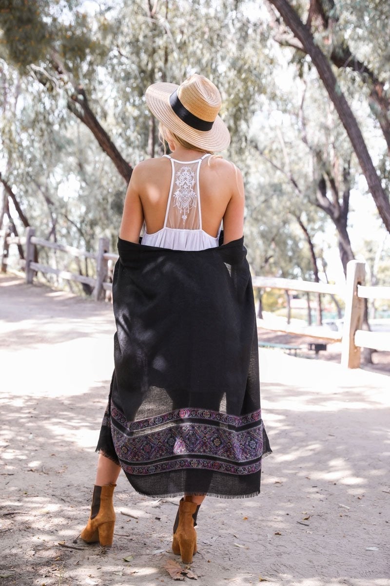 Tattoo Back Slip dress featuring ruffled trim and a unique tattoo mesh back design, perfect for stylish occasions.