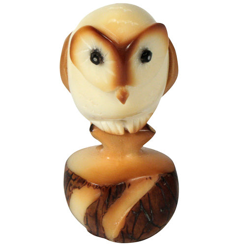 Hand-carved Tawny Owl figurine made from tagua nut, showcasing intricate details and natural colors, symbolizing eco-friendly craftsmanship.