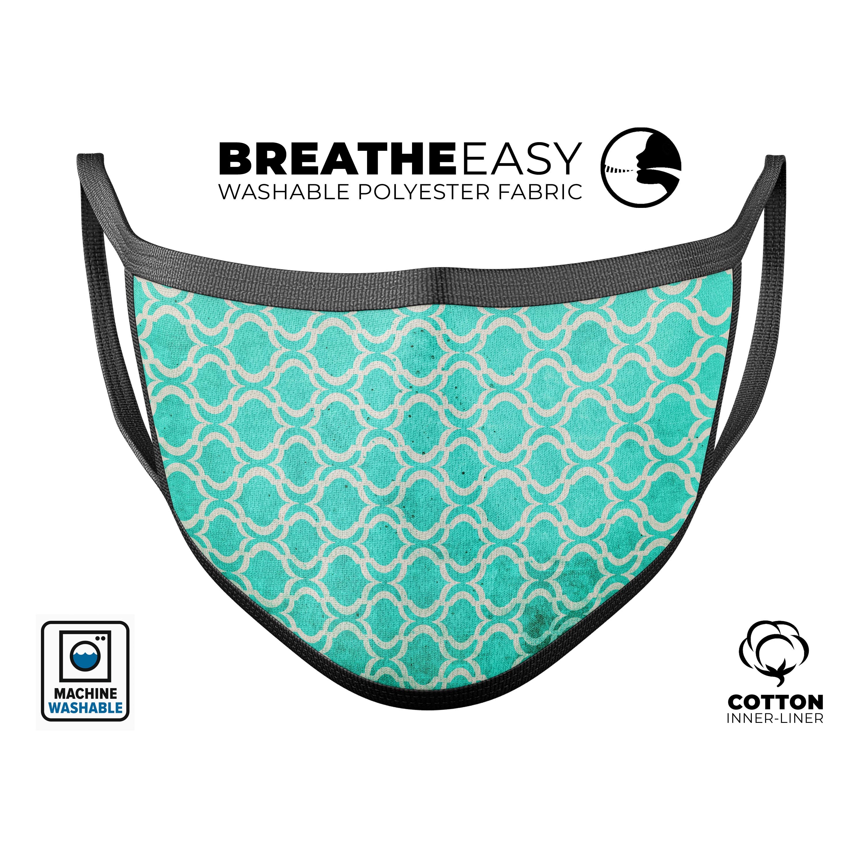 Teal and white bubble Moroccan pattern reusable face mask, showcasing adjustable ear-loops and soft cotton interior.