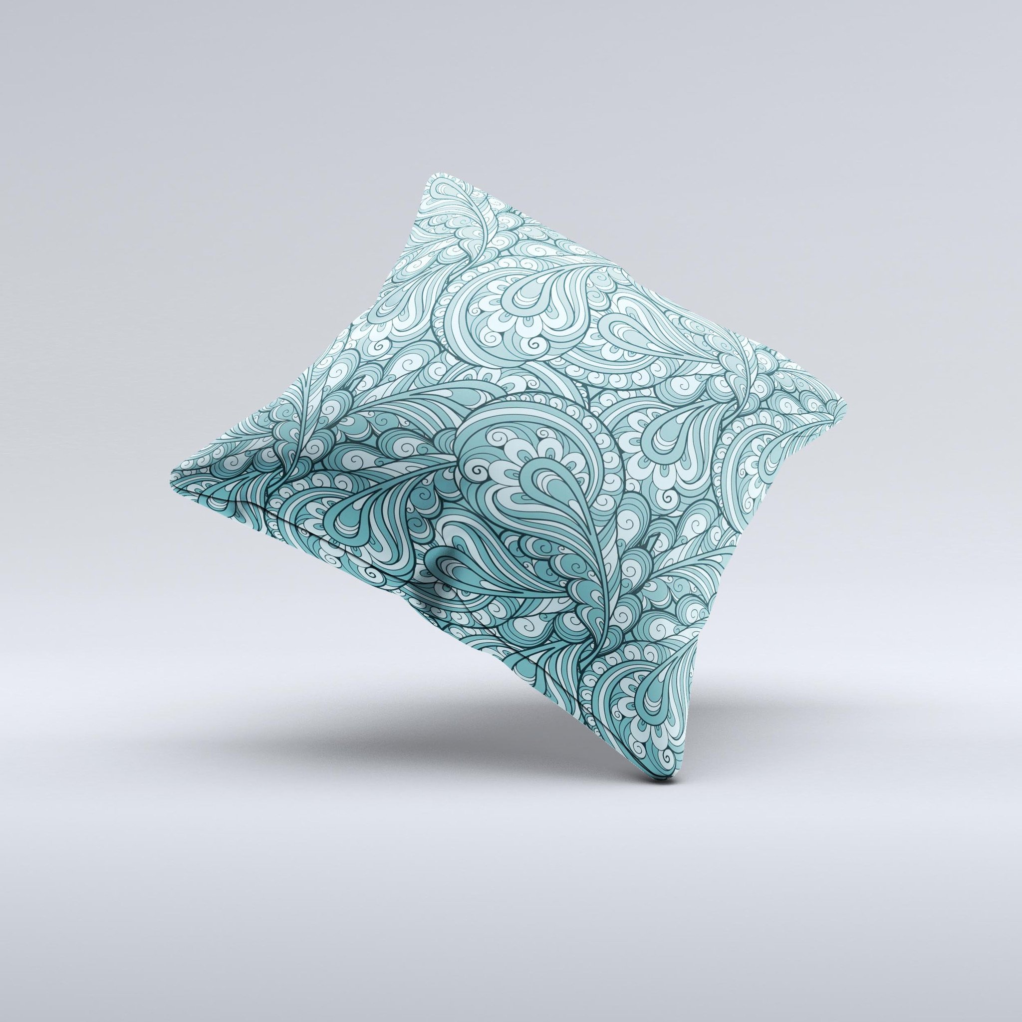 Teal decorative throw pillow featuring a floral paisley pattern, showcasing vibrant colors and intricate designs, perfect for home decor.