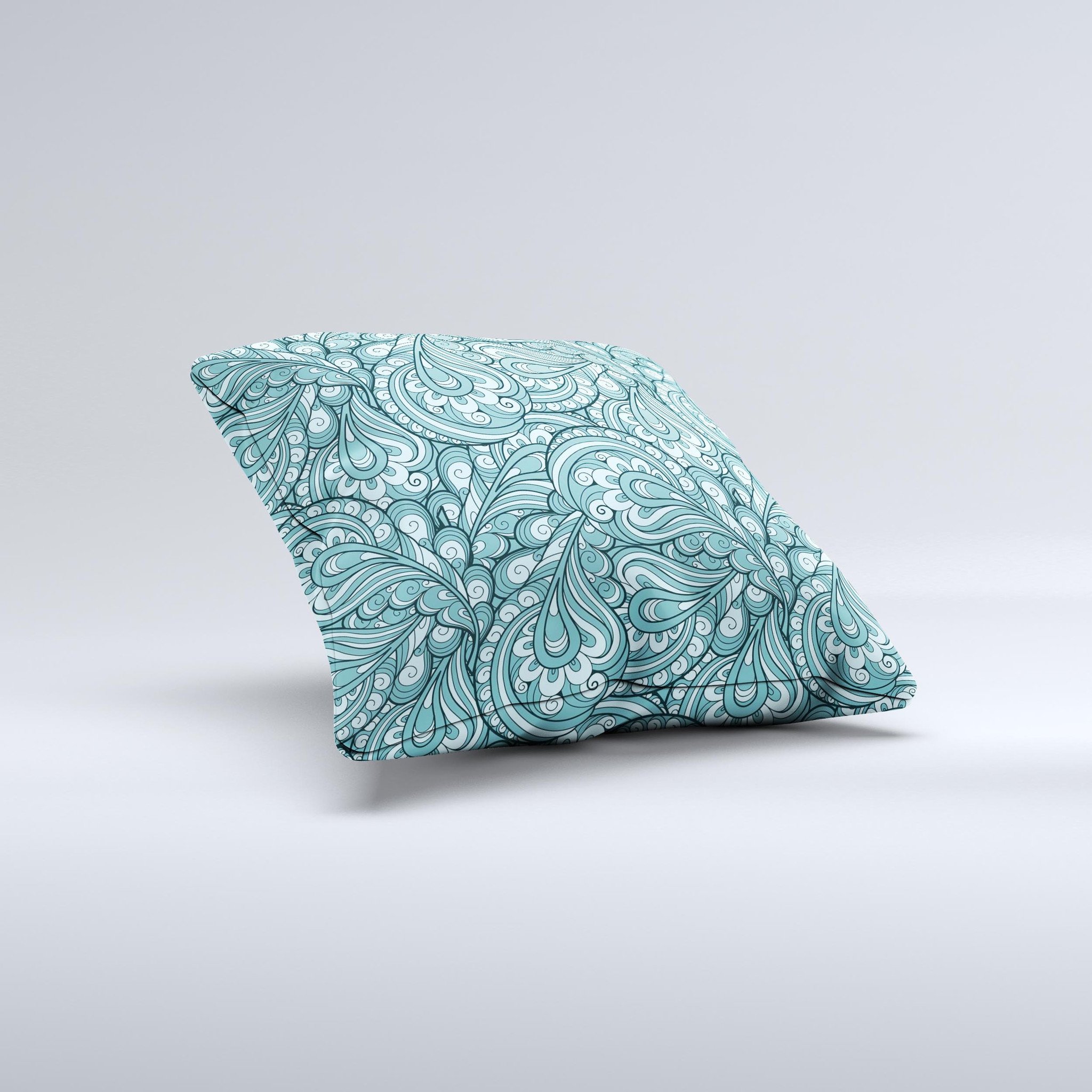 Teal decorative throw pillow featuring a floral paisley pattern, showcasing vibrant colors and intricate designs, perfect for home decor.