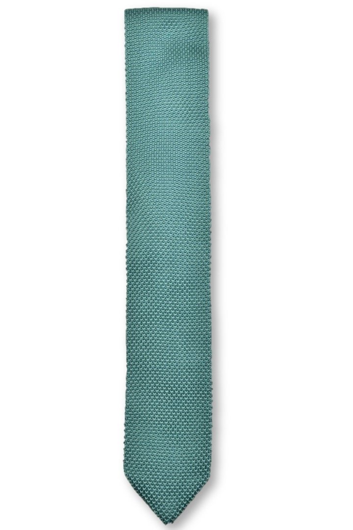 Teal knitted tie with a pointed end, made from polyester, showcasing a stylish design suitable for formal occasions.