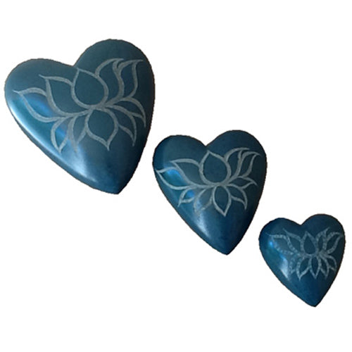 Teal Soapstone Heart with etched lotus design, handcrafted by Haitian artisans, showcasing intricate details and vibrant color.