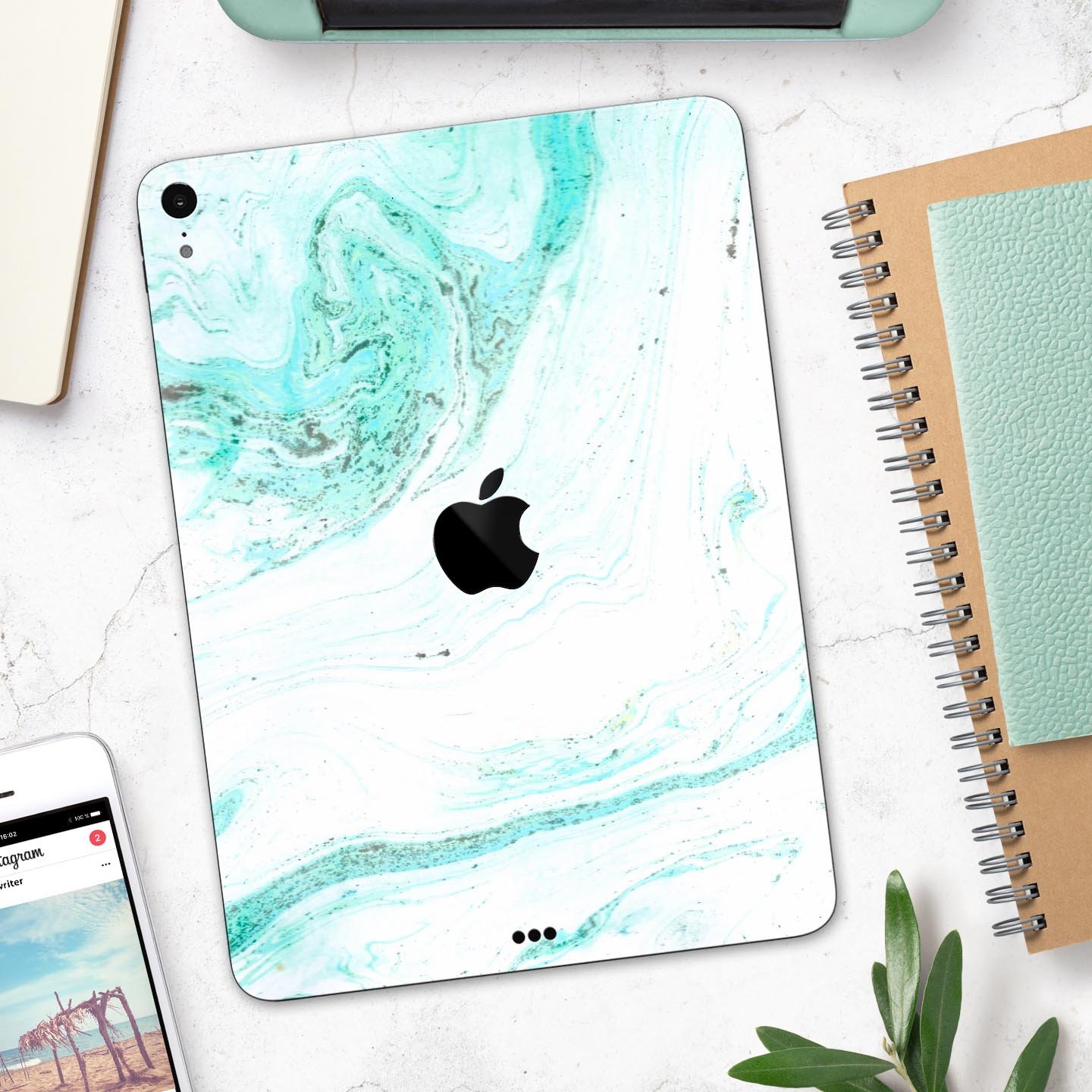 Teal v4 Textured Marble skin decal for Apple iPad Pro, showcasing a stylish marble design with a smooth finish.