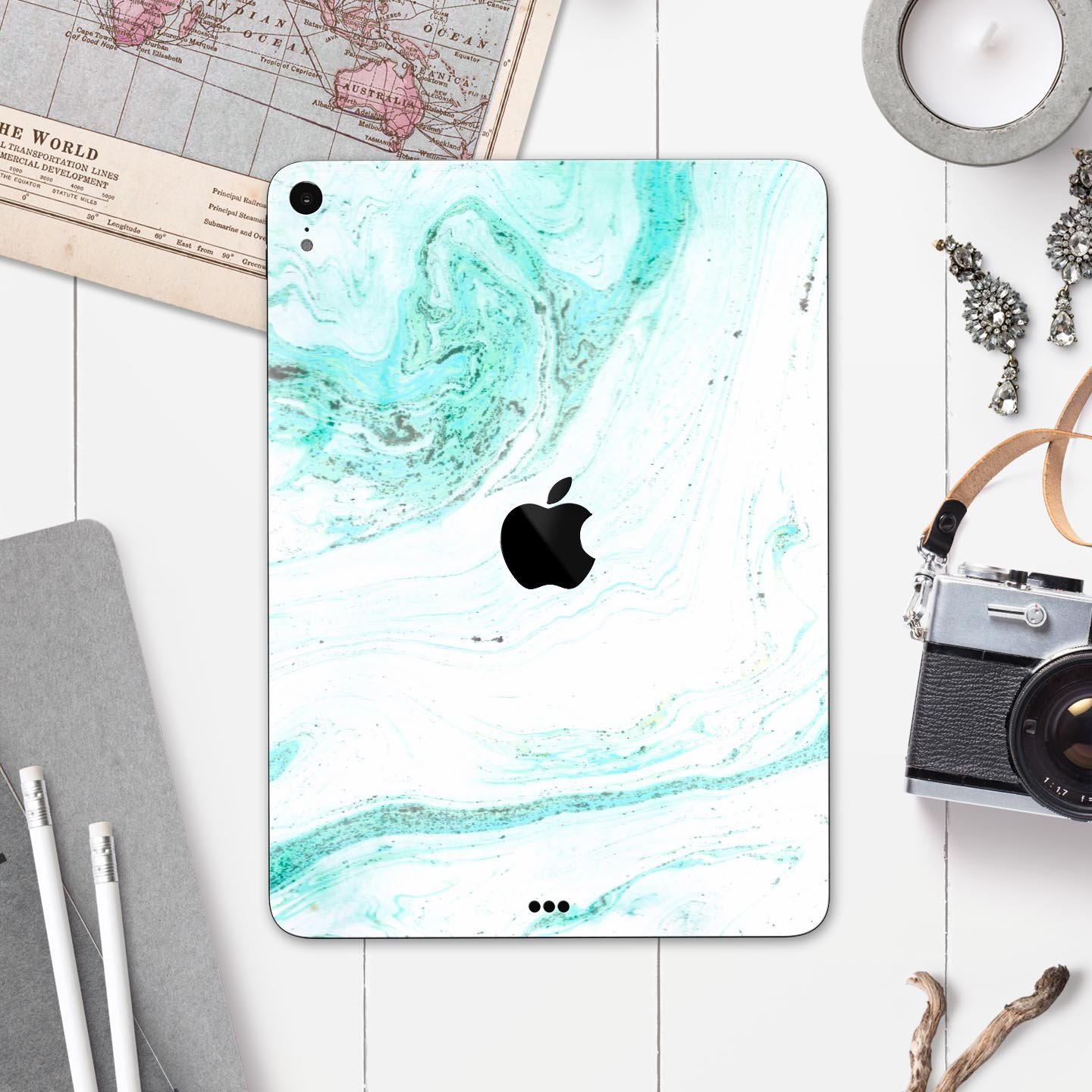 Teal v4 Textured Marble skin decal for Apple iPad Pro, showcasing a stylish marble design with a smooth finish.