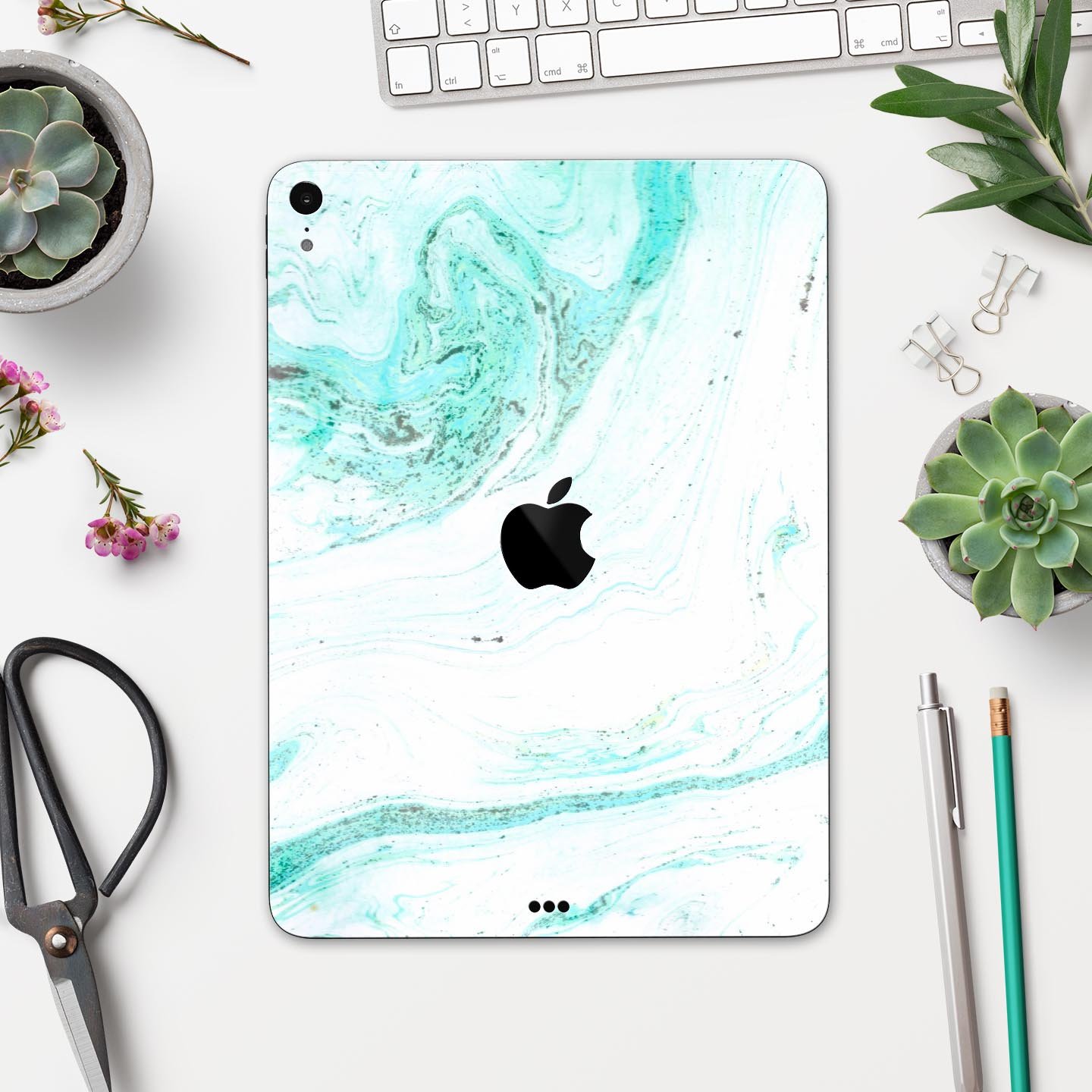 Teal v4 Textured Marble skin decal for Apple iPad Pro, showcasing a stylish marble design with a smooth finish.