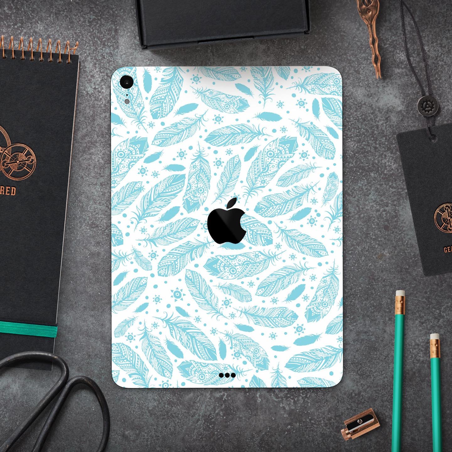 Teal Zendoodle Feathers skin decal for Apple iPad Pro, showcasing intricate feather patterns and vibrant colors.