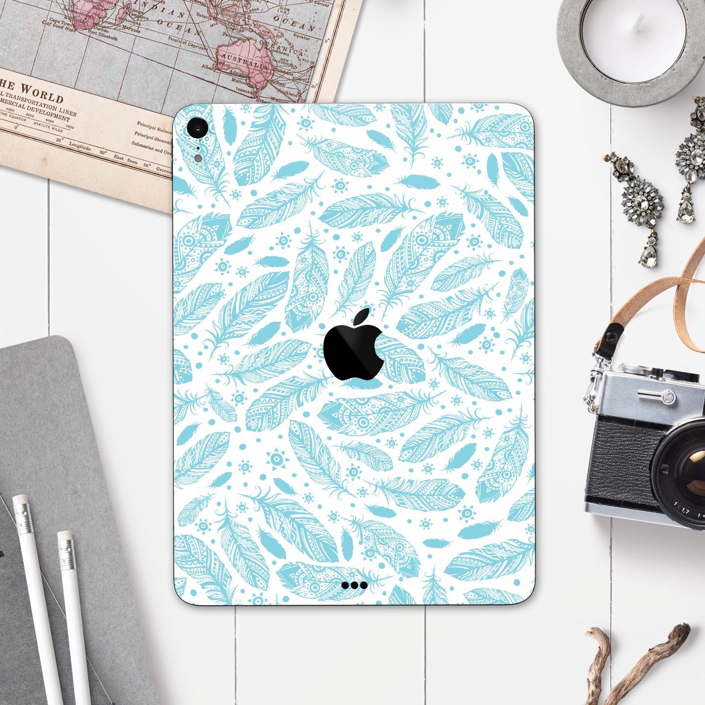 Teal Zendoodle Feathers skin decal for Apple iPad Pro, showcasing intricate feather patterns and vibrant colors.