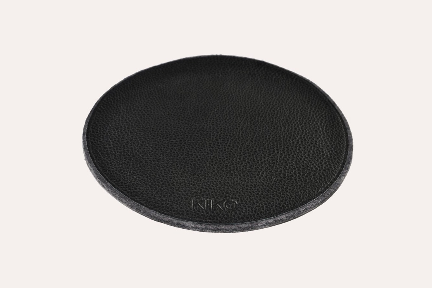 Elegant leather and wool felt Tech Pad with heat burnished details, perfect for mouse use and protecting tech devices.