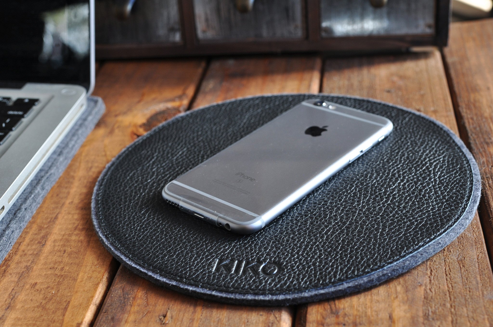 Elegant leather and wool felt Tech Pad with heat burnished details, perfect for mouse use and protecting tech devices.