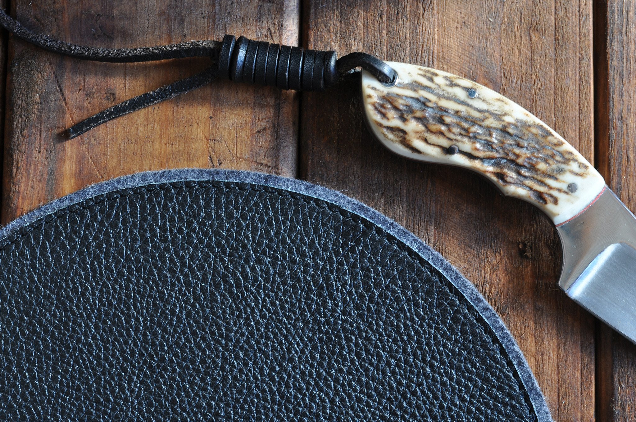 Elegant leather and wool felt Tech Pad with heat burnished details, perfect for mouse use and protecting tech devices.