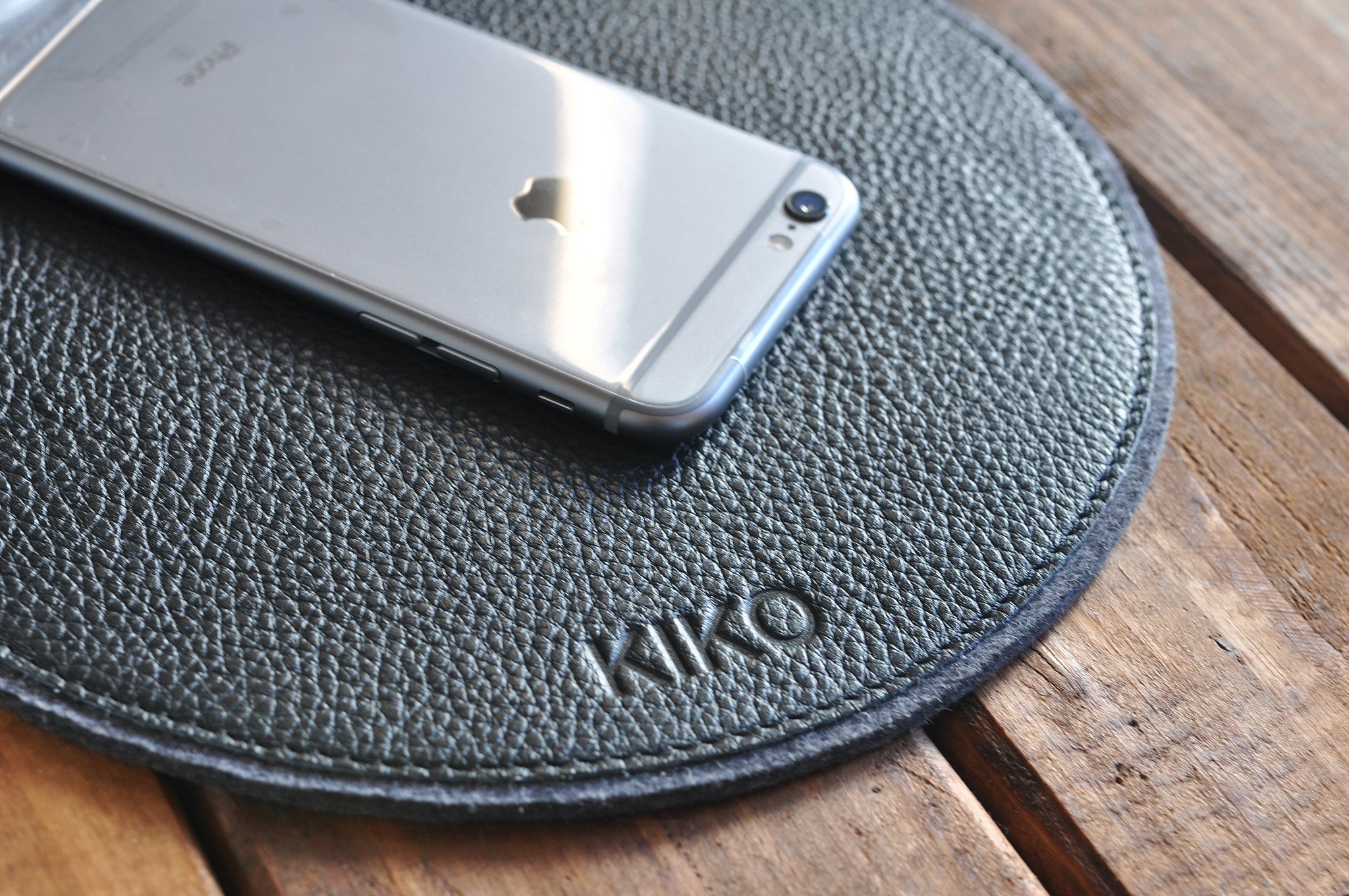 Elegant leather and wool felt Tech Pad with heat burnished details, perfect for mouse use and protecting tech devices.