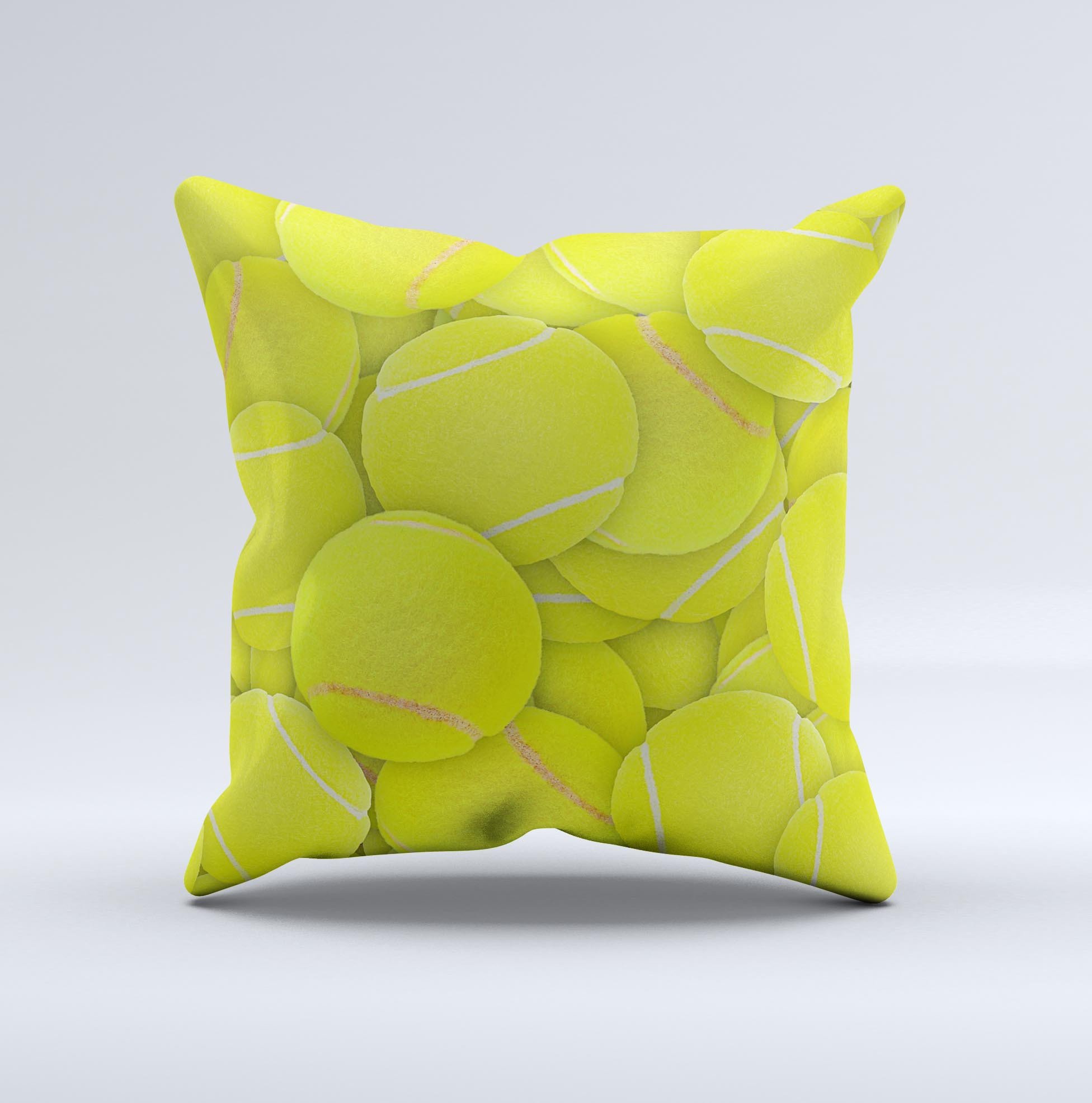 A decorative throw pillow featuring a vibrant tennis ball overlay design, handcrafted in Virginia with high-quality materials.