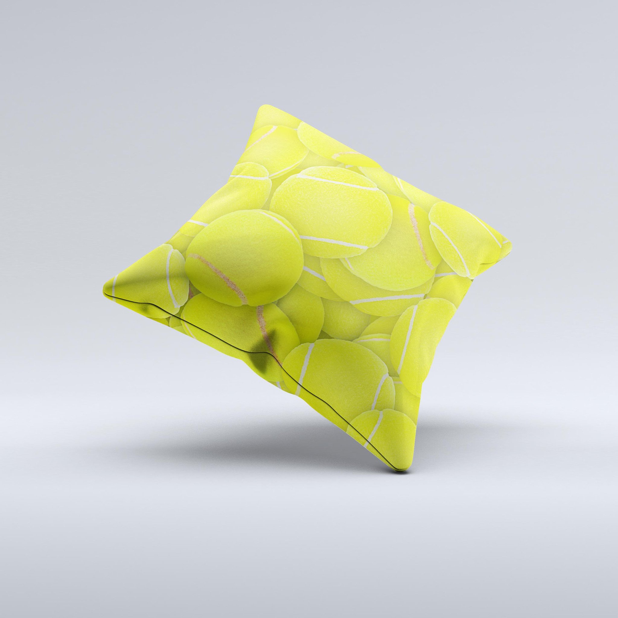 A decorative throw pillow featuring a vibrant tennis ball overlay design, handcrafted in Virginia with high-quality materials.