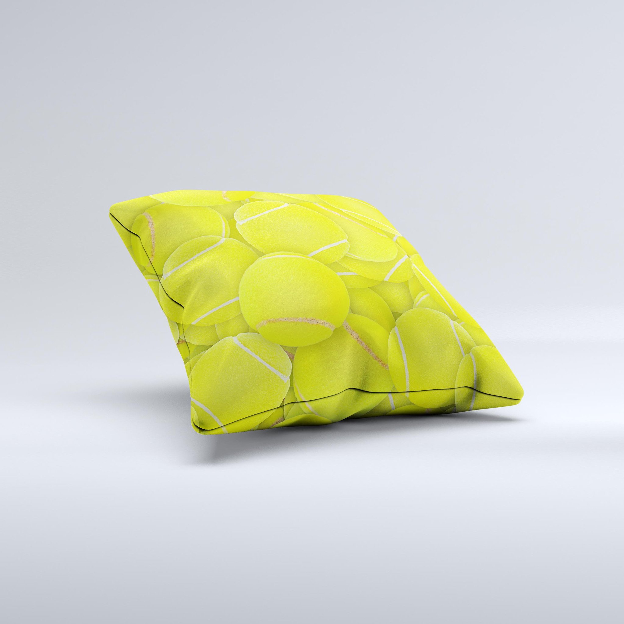 A decorative throw pillow featuring a vibrant tennis ball overlay design, handcrafted in Virginia with high-quality materials.