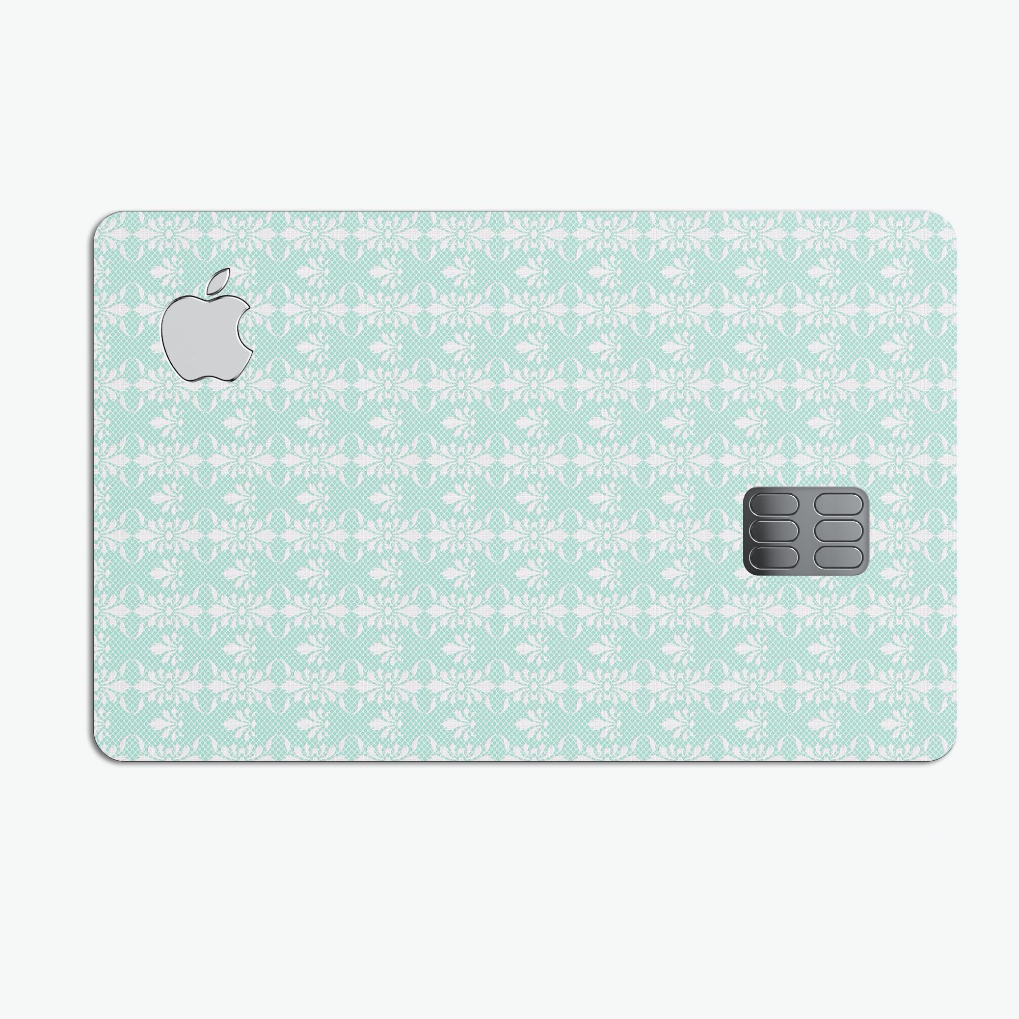 The All Over Mint Luxury Design skin applied to an Apple Card, showcasing its premium vinyl finish and stylish mint color.