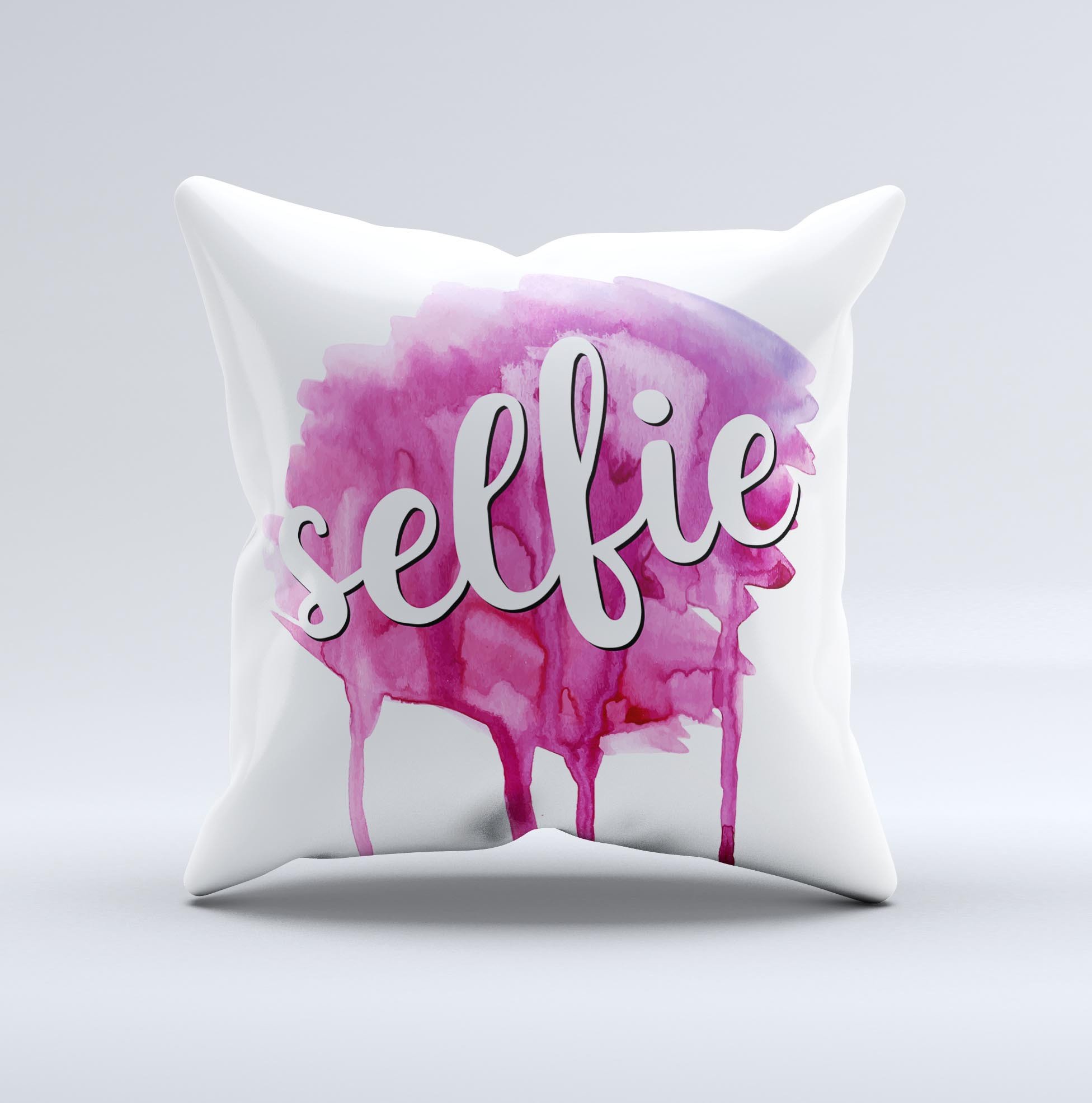 A vibrant decorative throw pillow featuring the phrase 'But First, Selfie' with a unique ink-fuzed design, handcrafted in Virginia.