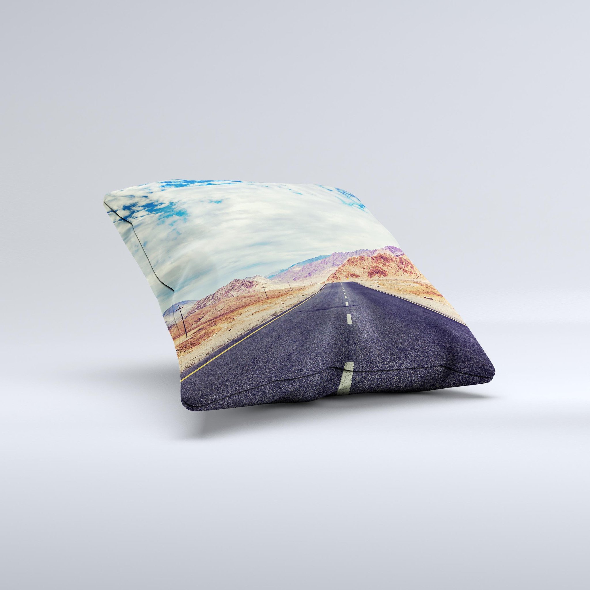 The Desert Road ink-Fuzed Decorative Throw Pillow featuring a unique handcrafted design with high thread count fabric and vibrant colors.