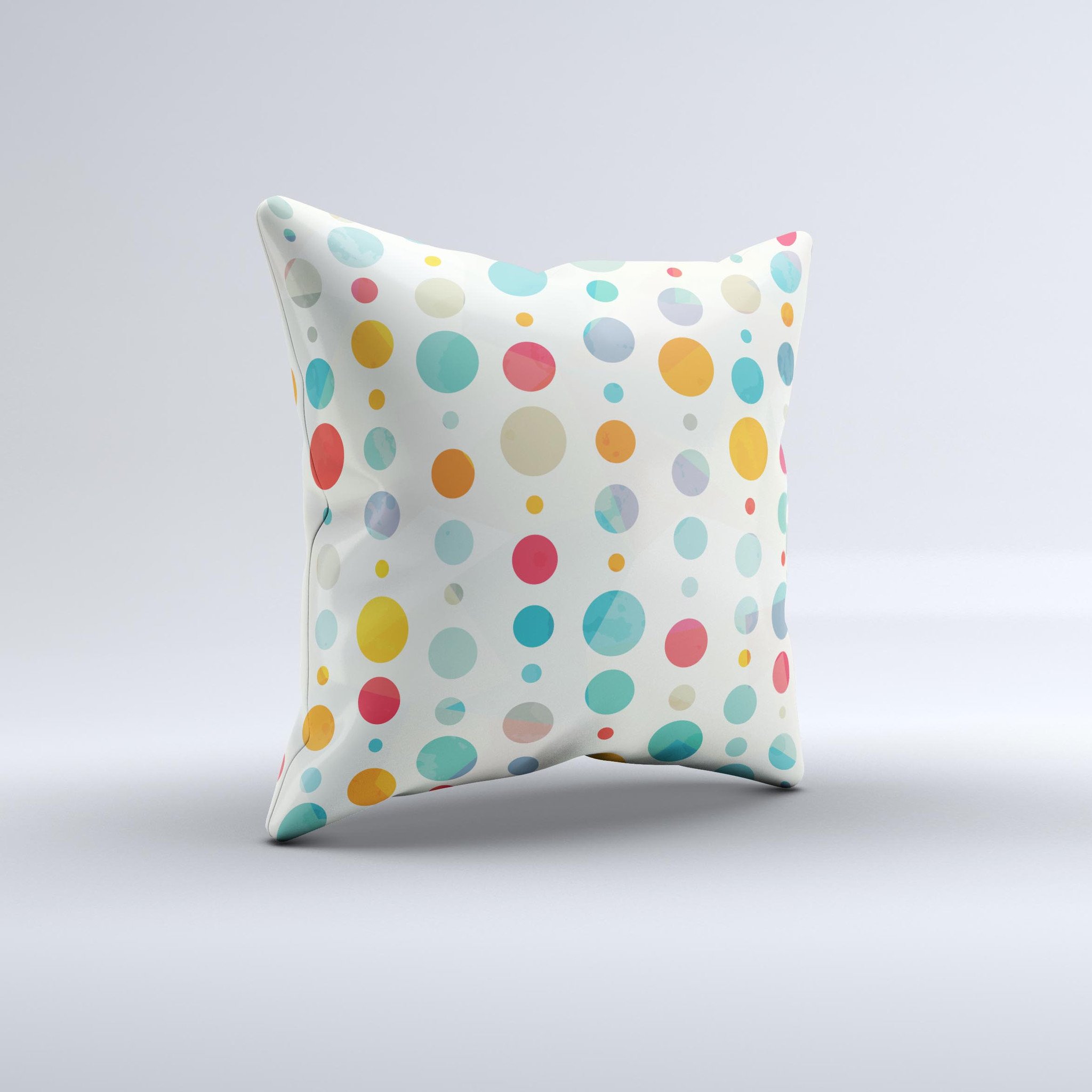 A vibrant decorative throw pillow featuring a fun polka pattern, handcrafted in Virginia with high-quality materials.