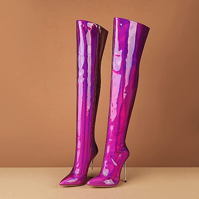 The Mishawn Over the Knee Boot featuring a sleek design, plush lining, and elastic patent leather material, elegantly displayed in a tulle keepsake box.