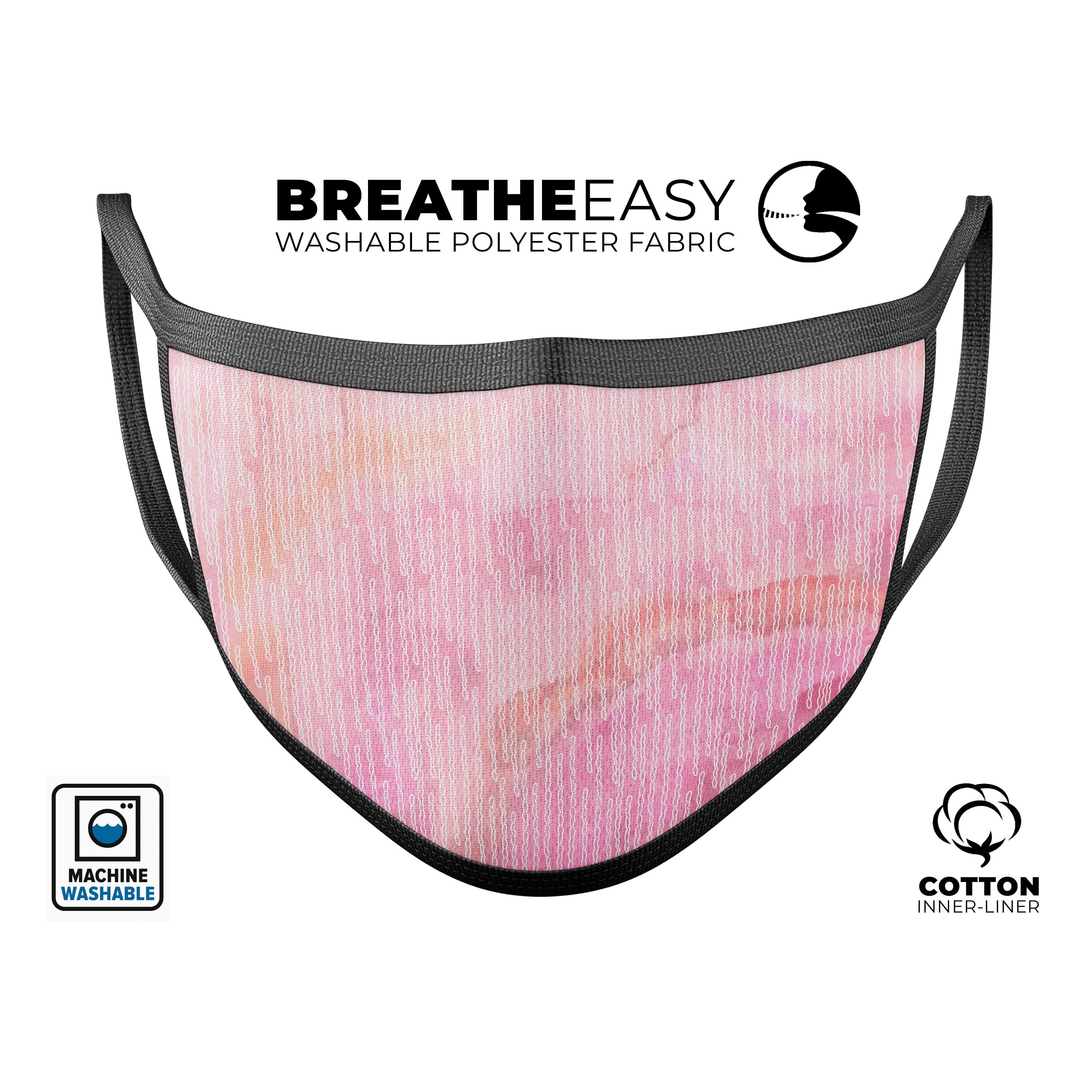 A vibrant Pink Orange Watercolors face mask showcasing a beautiful dye-sublimated design, made in the USA.