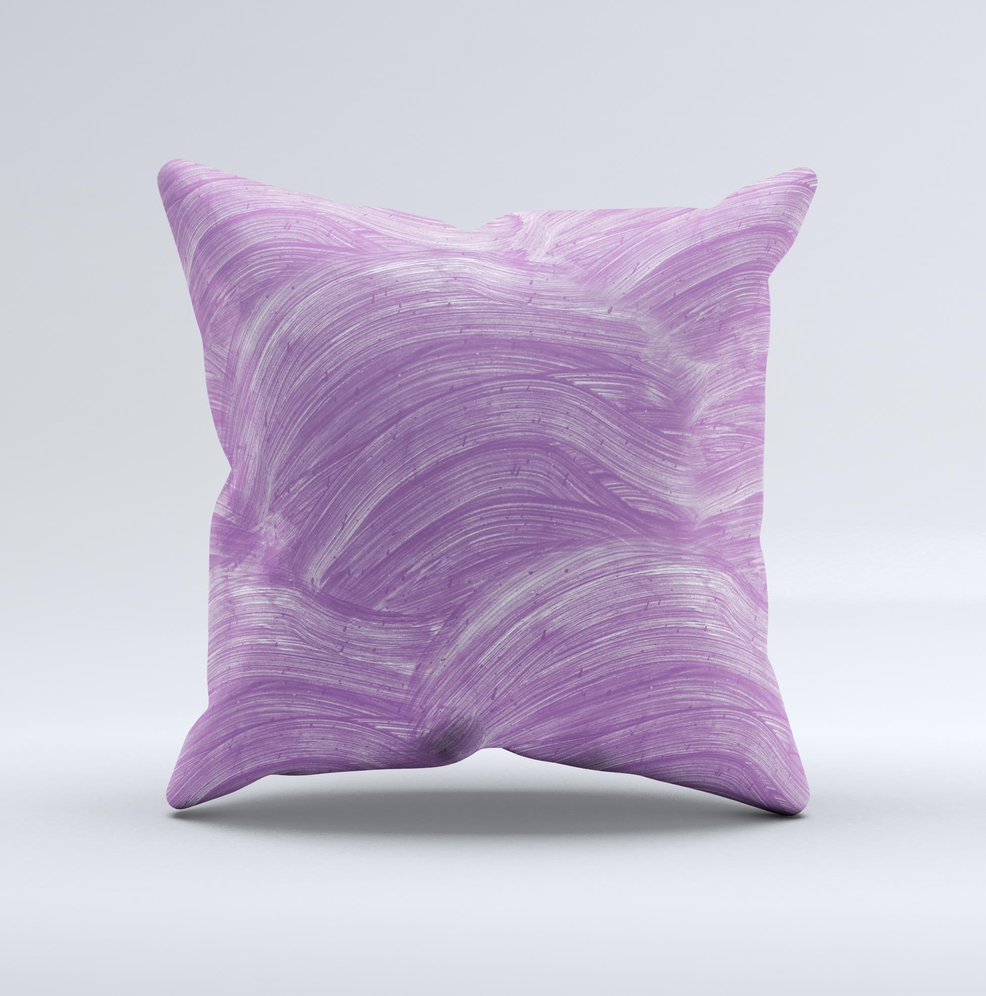 A beautifully handcrafted decorative throw pillow featuring purple brush strokes, showcasing unique imperfections and high-quality fabric.