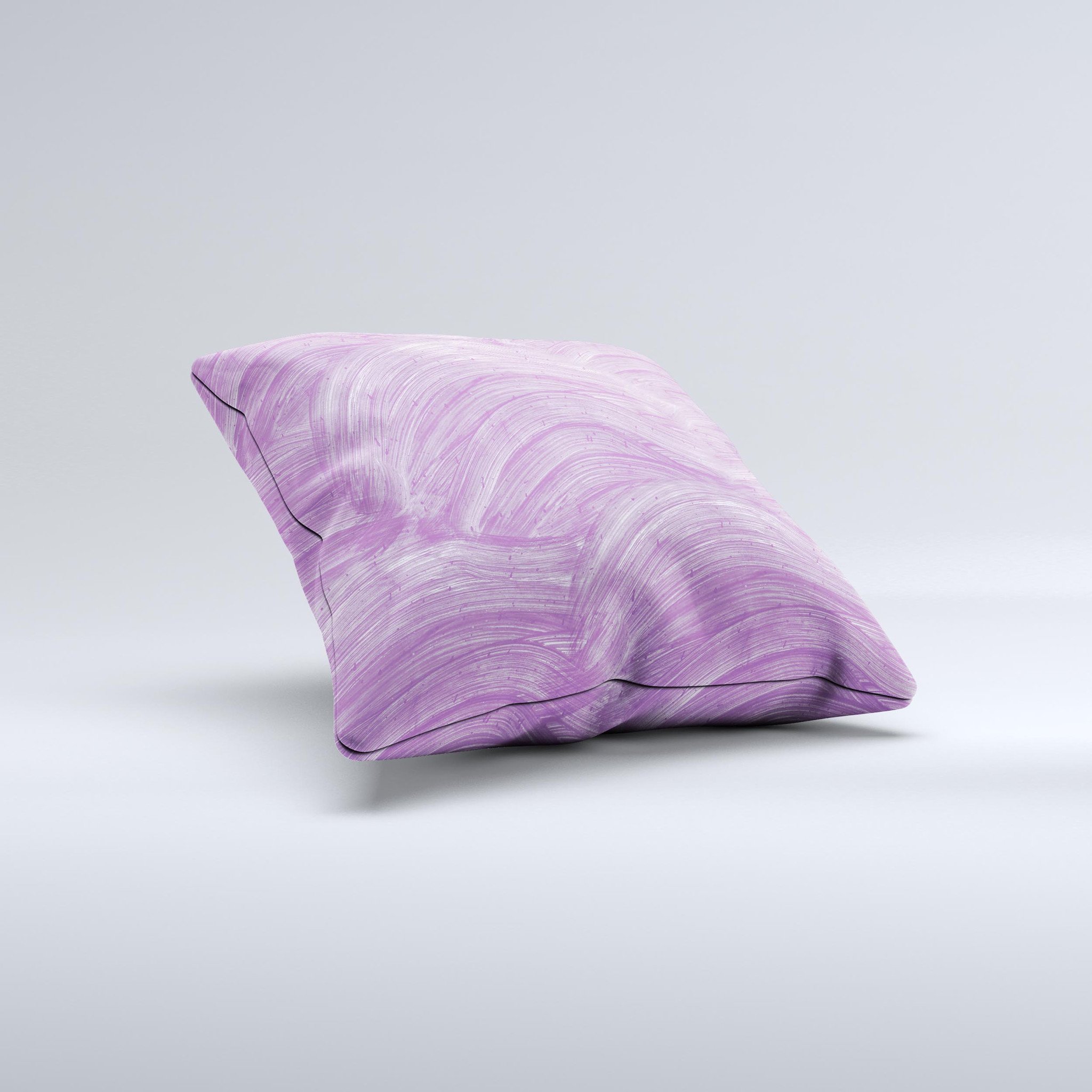 A beautifully handcrafted decorative throw pillow featuring purple brush strokes, showcasing unique imperfections and high-quality fabric.