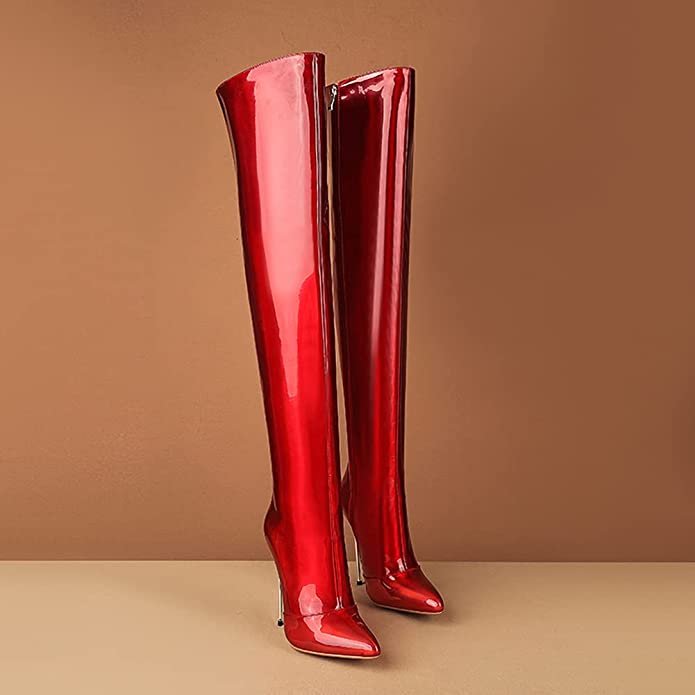 The Red Nevari Over the Knee Boot showcasing its elegant design, plush interior, and stylish red color.