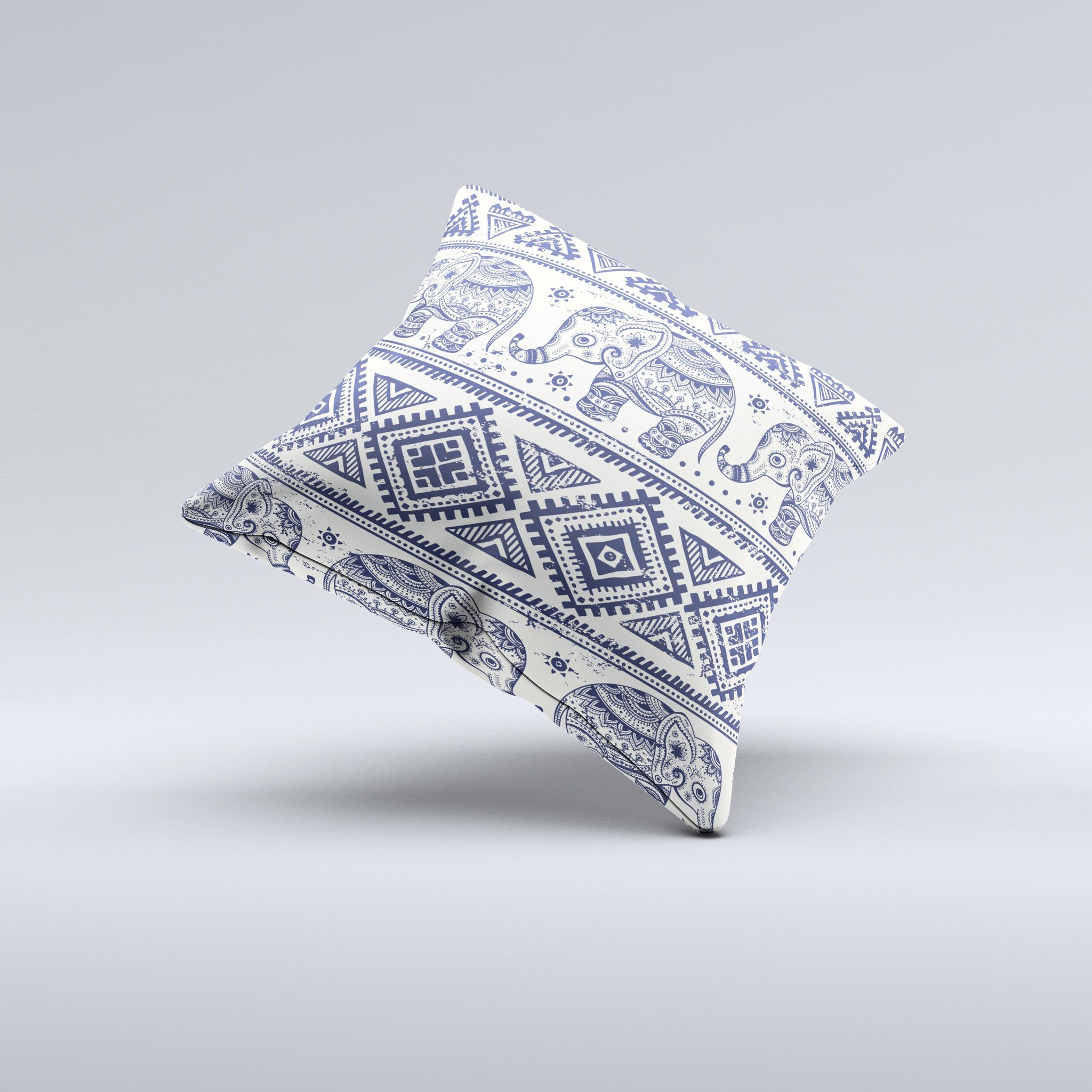 A beautifully crafted decorative throw pillow featuring a sacred elephant pattern, showcasing vibrant colors and unique handmade details.