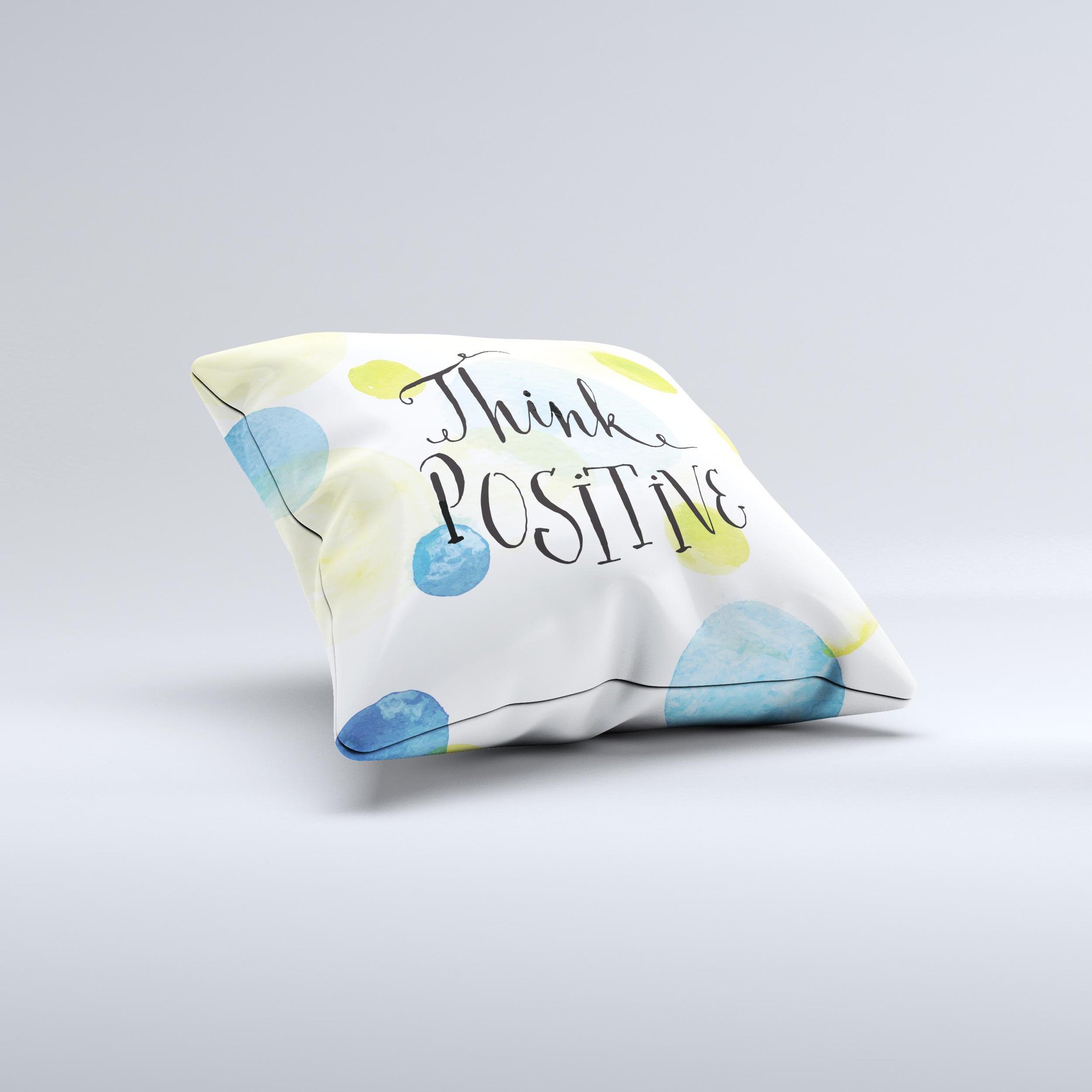 A handcrafted decorative throw pillow with a positive message, featuring high thread count fabric and unique design imperfections.