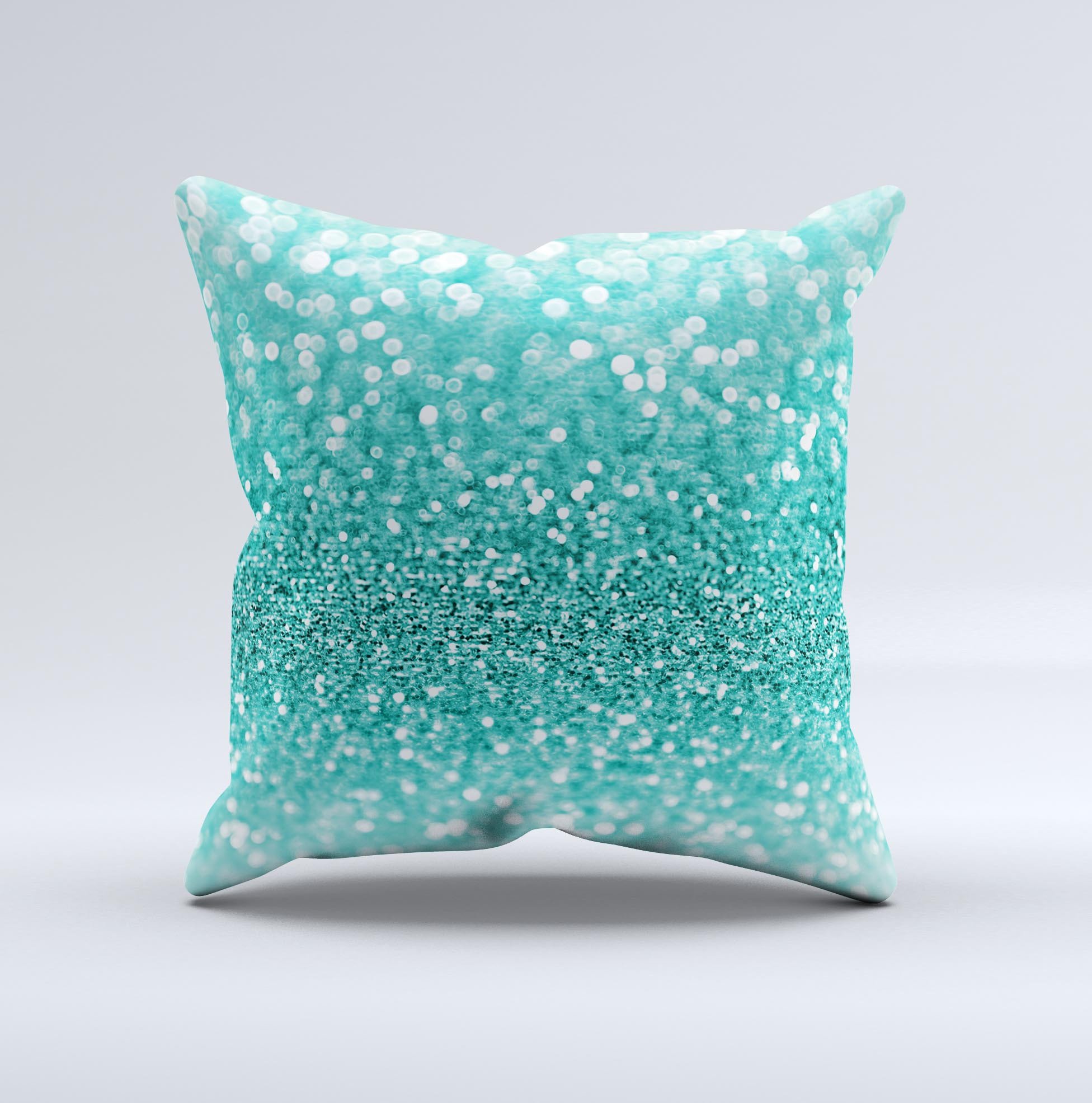 Turquoise decorative throw pillow with glimmering design, handcrafted in Virginia, showcasing unique imperfections.