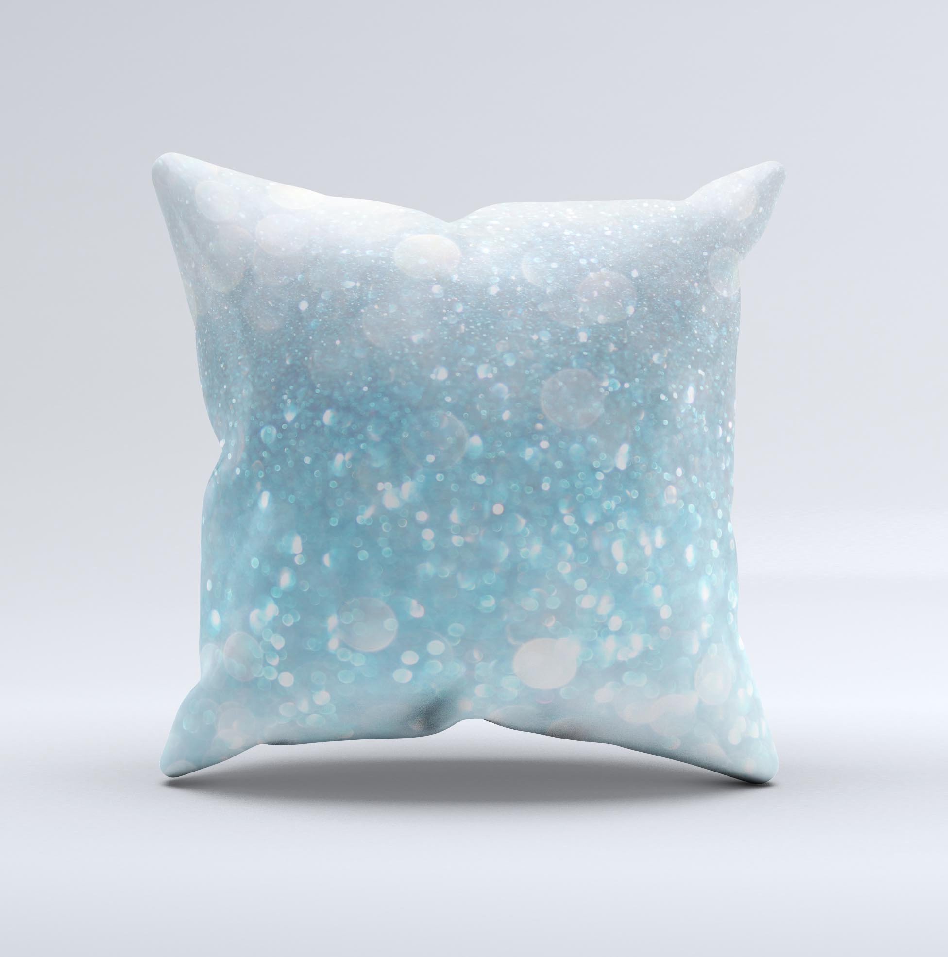 A handmade decorative throw pillow featuring an unfocused abstract blue rain design, crafted in Virginia with high thread count fabric.