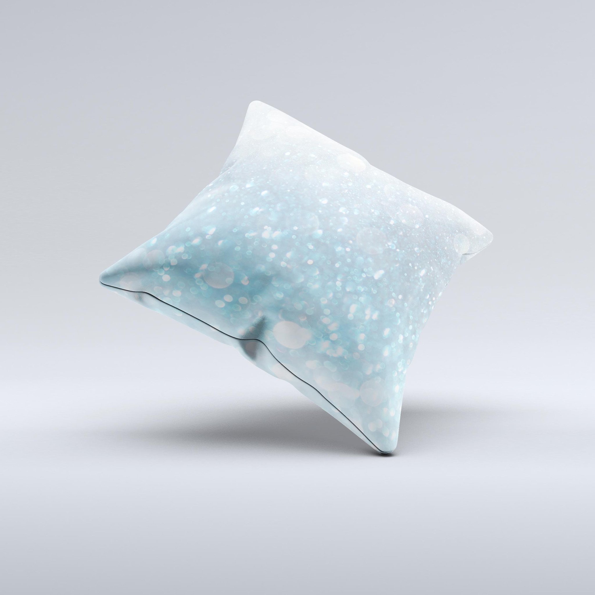 A handmade decorative throw pillow featuring an unfocused abstract blue rain design, crafted in Virginia with high thread count fabric.