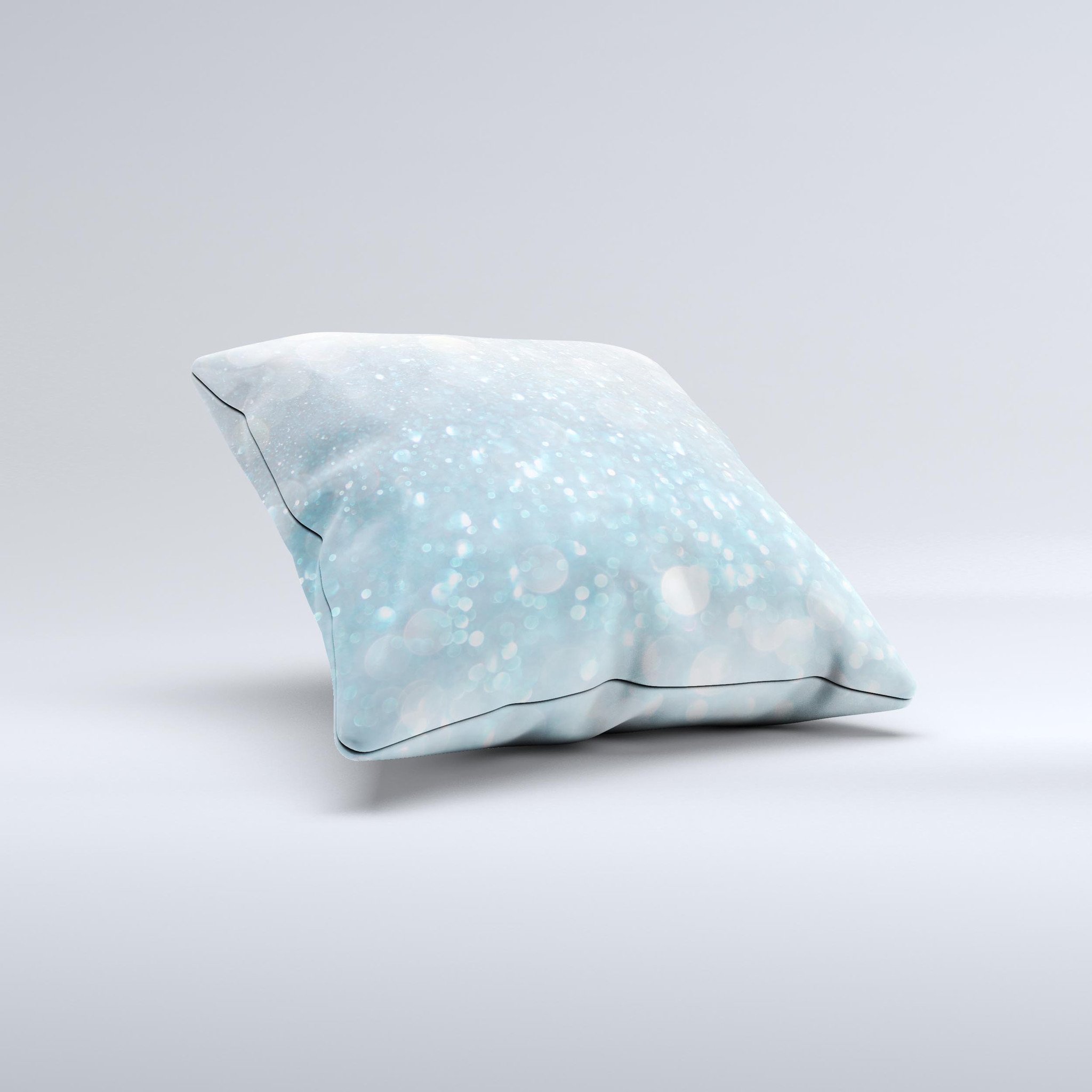 A handmade decorative throw pillow featuring an unfocused abstract blue rain design, crafted in Virginia with high thread count fabric.