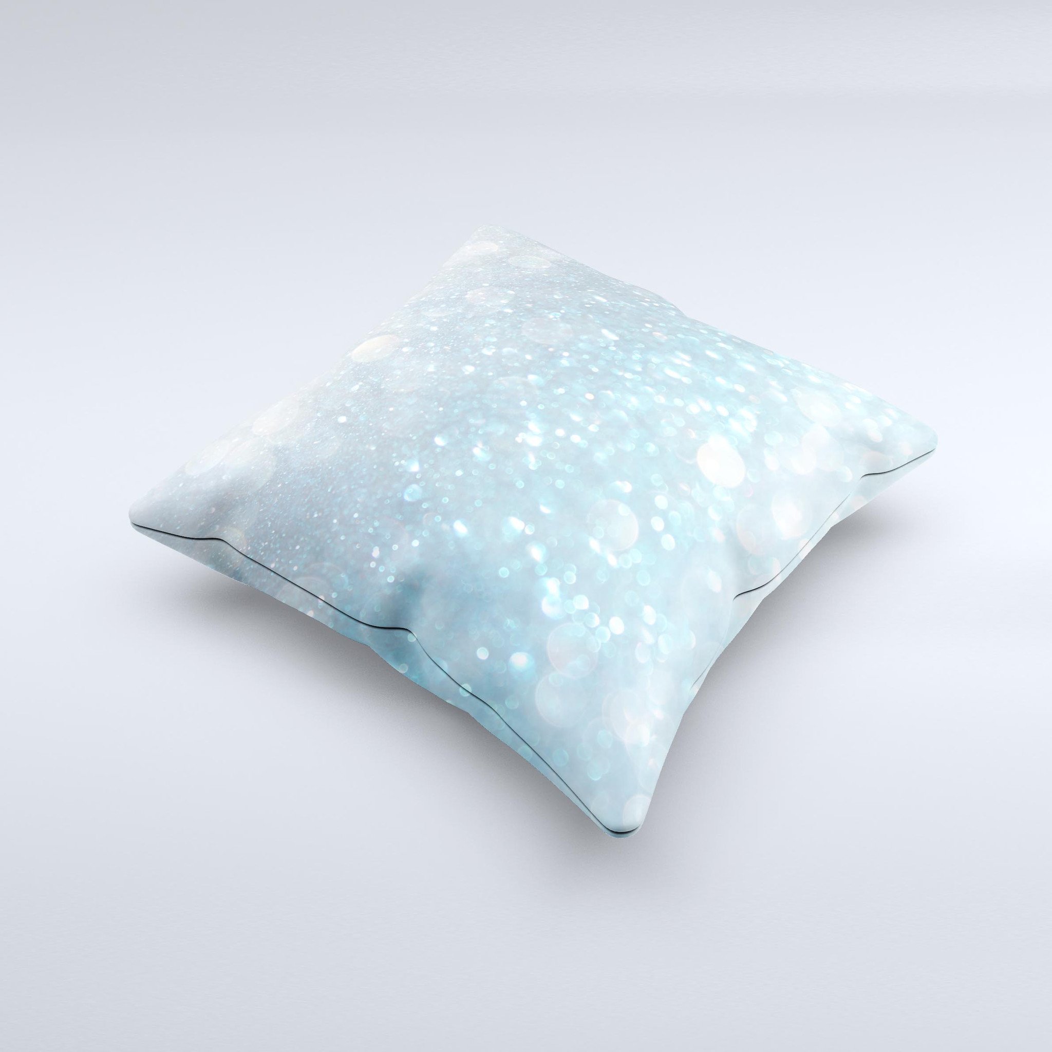 A handmade decorative throw pillow featuring an unfocused abstract blue rain design, crafted in Virginia with high thread count fabric.