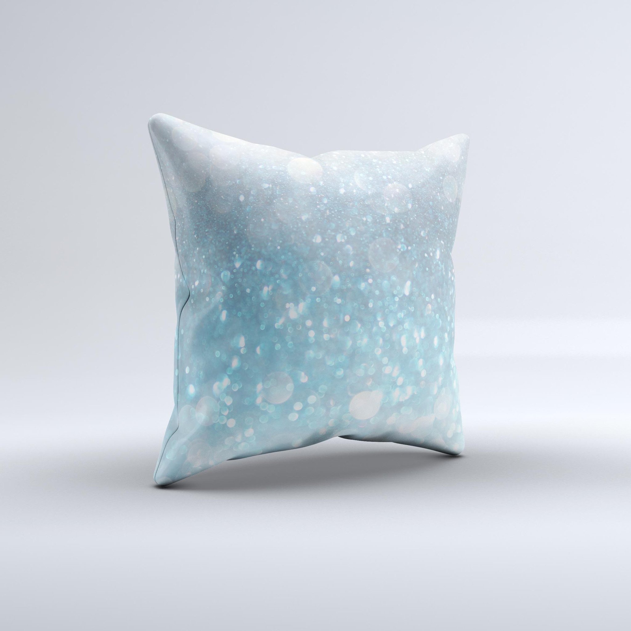 A handmade decorative throw pillow featuring an unfocused abstract blue rain design, crafted in Virginia with high thread count fabric.