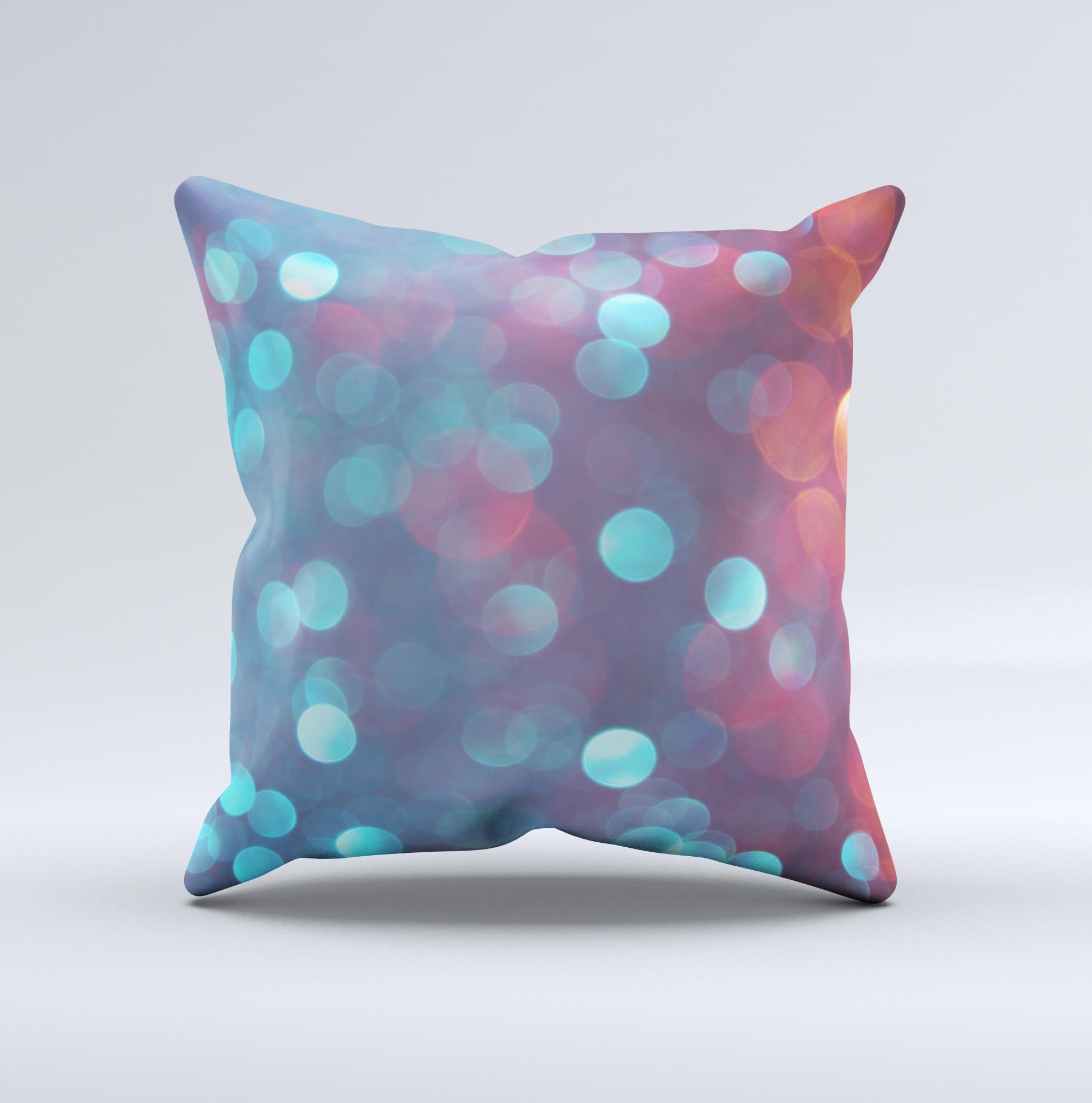 Handcrafted decorative throw pillow featuring unfocused blue and red orbs design, made in Virginia with high-quality materials.