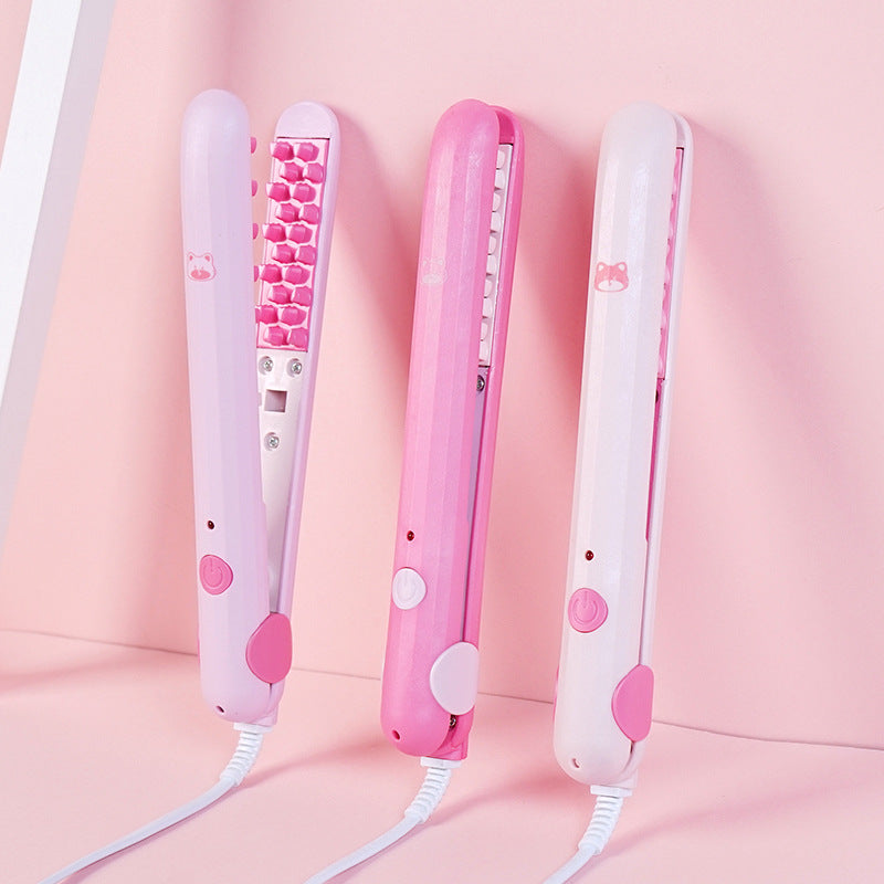 The Whimsical 2-in-1 Curling & Hair Straightener set featuring a sleek design, ceramic plates, and a user-friendly interface for versatile styling.