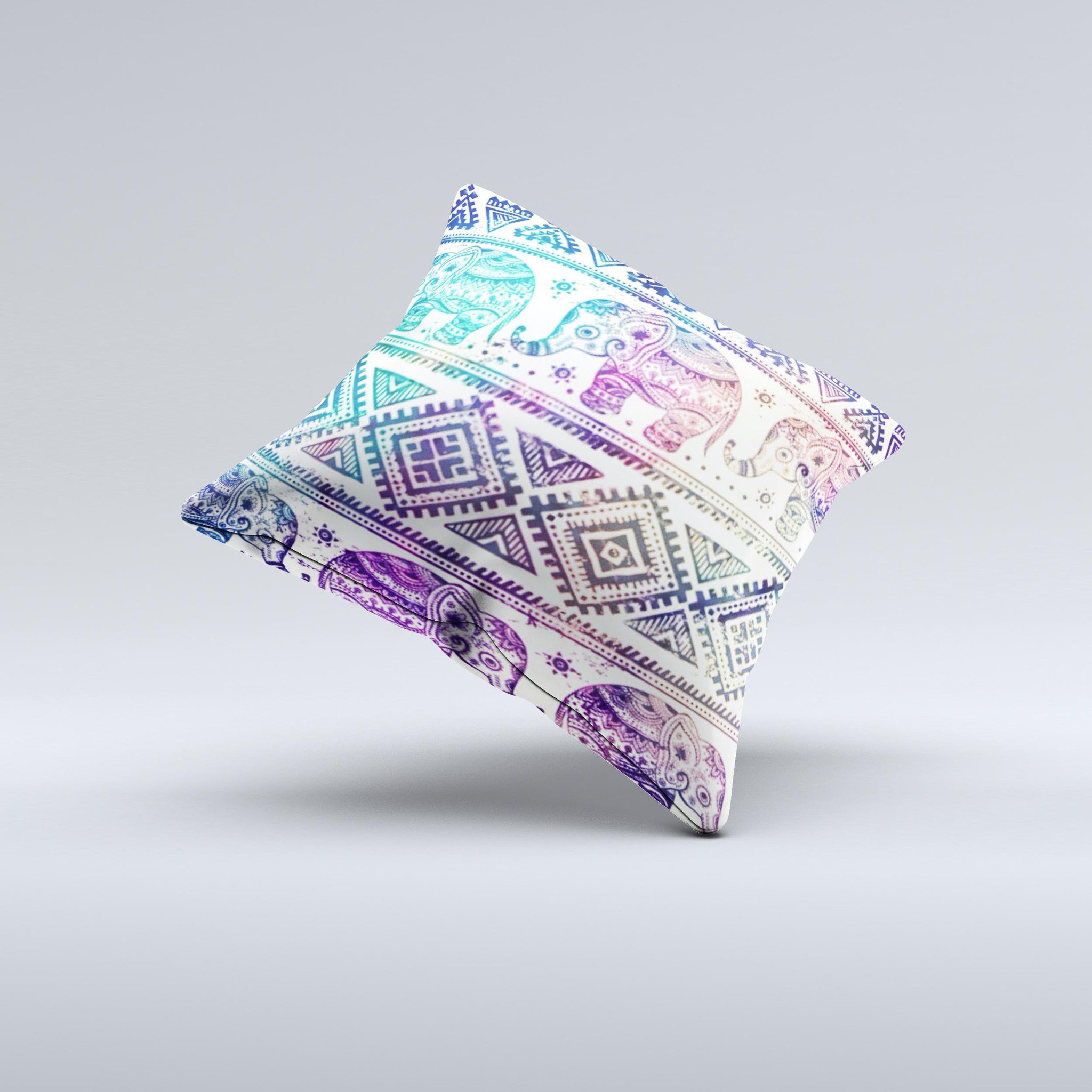 A vibrant tie-dyed decorative throw pillow featuring an intricate Aztec elephant pattern, handcrafted in Virginia.