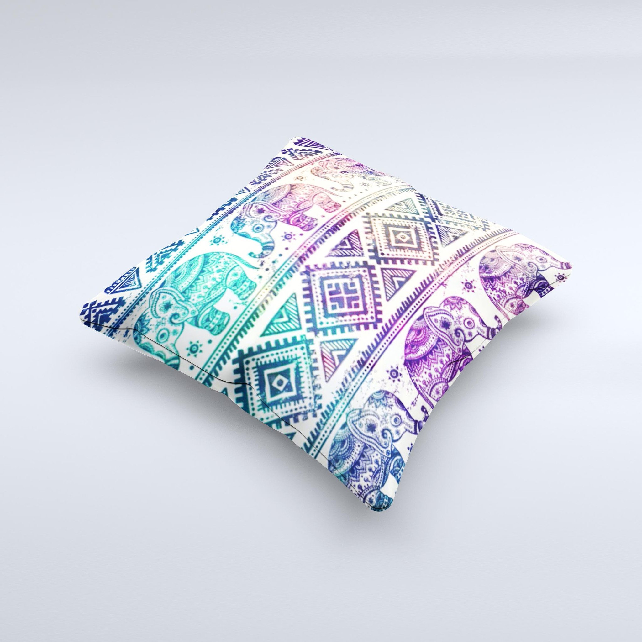 A vibrant tie-dyed decorative throw pillow featuring an intricate Aztec elephant pattern, handcrafted in Virginia.