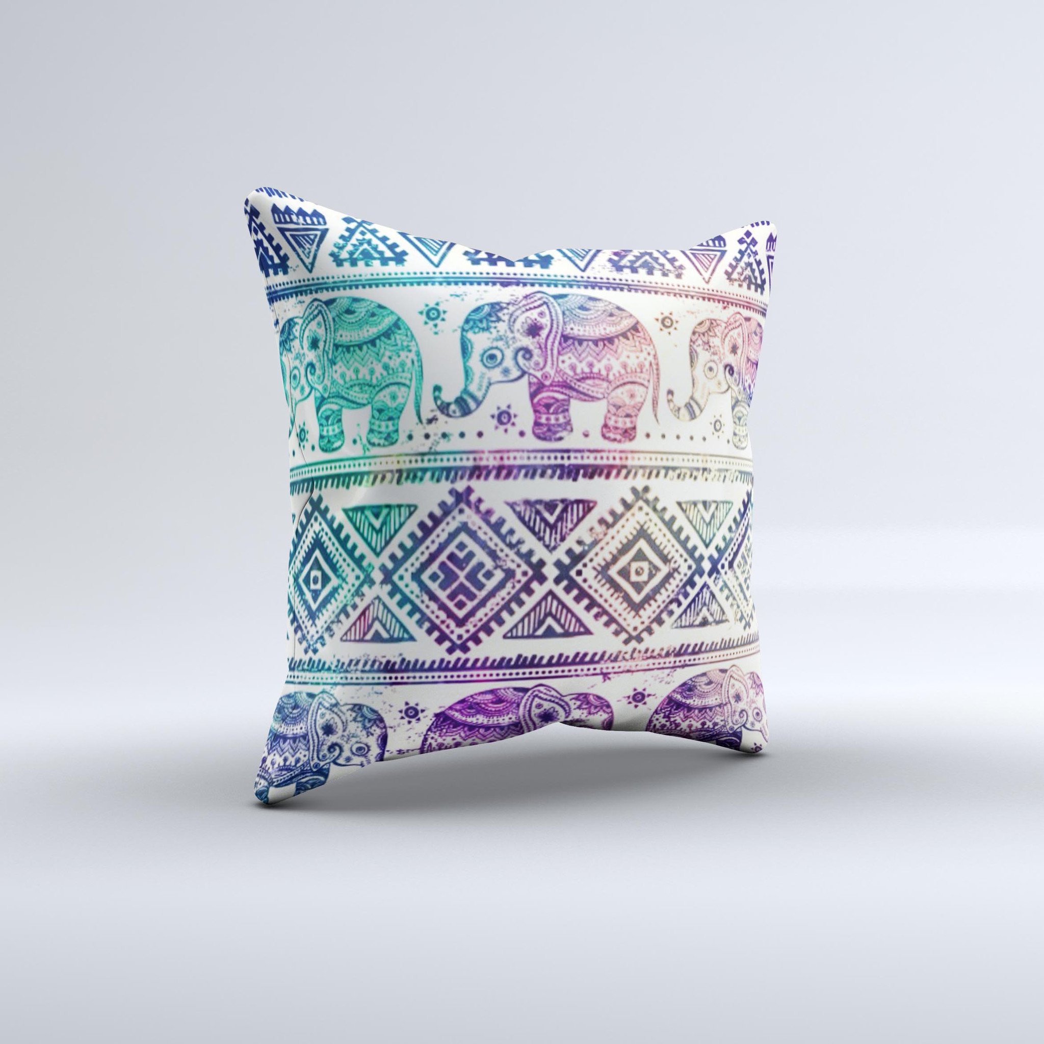 A vibrant tie-dyed decorative throw pillow featuring an intricate Aztec elephant pattern, handcrafted in Virginia.