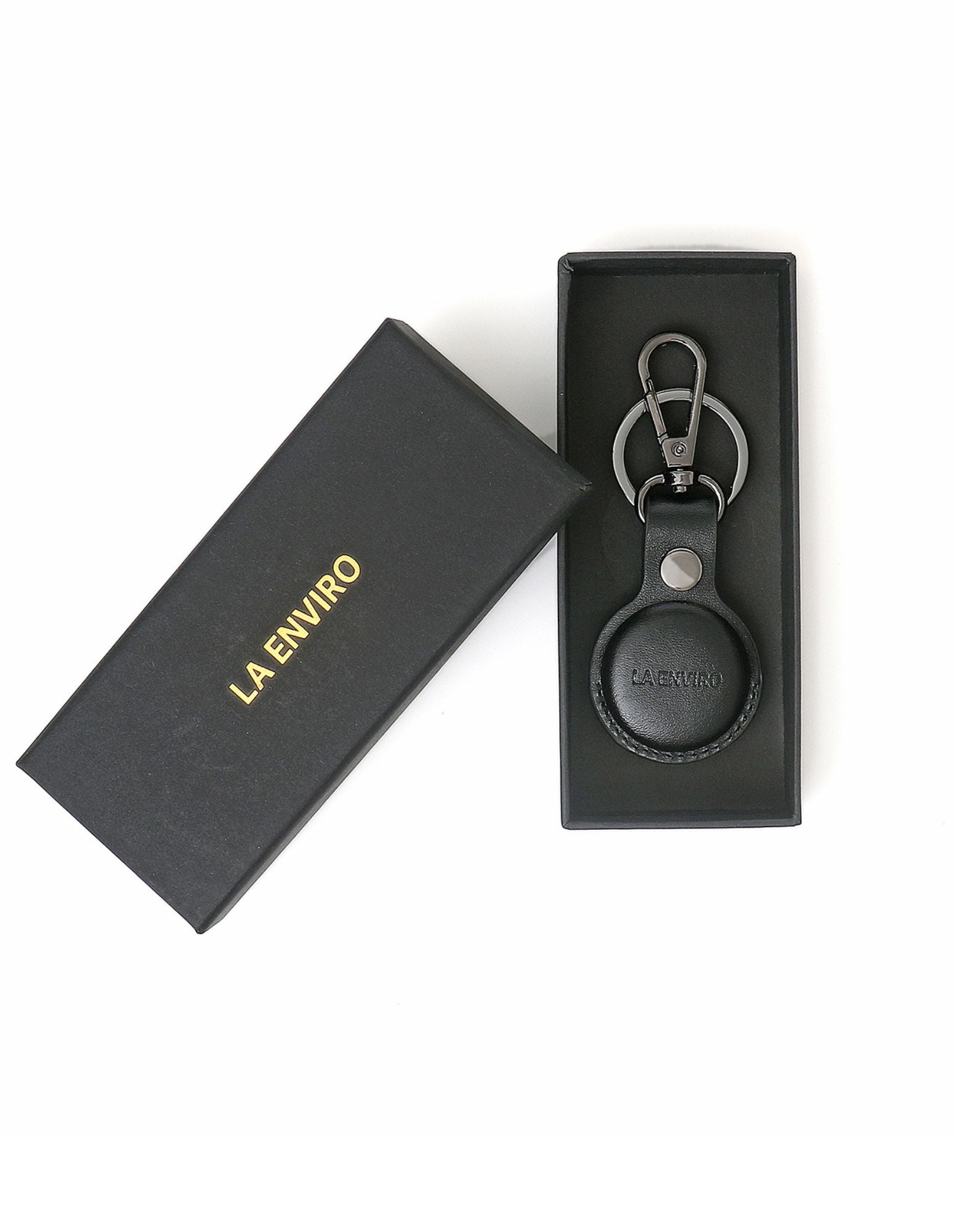 TILBA Airtag Keyring X 2 in Black, made from premium vegan leather with stainless steel accents, elegantly packaged in a gift box.