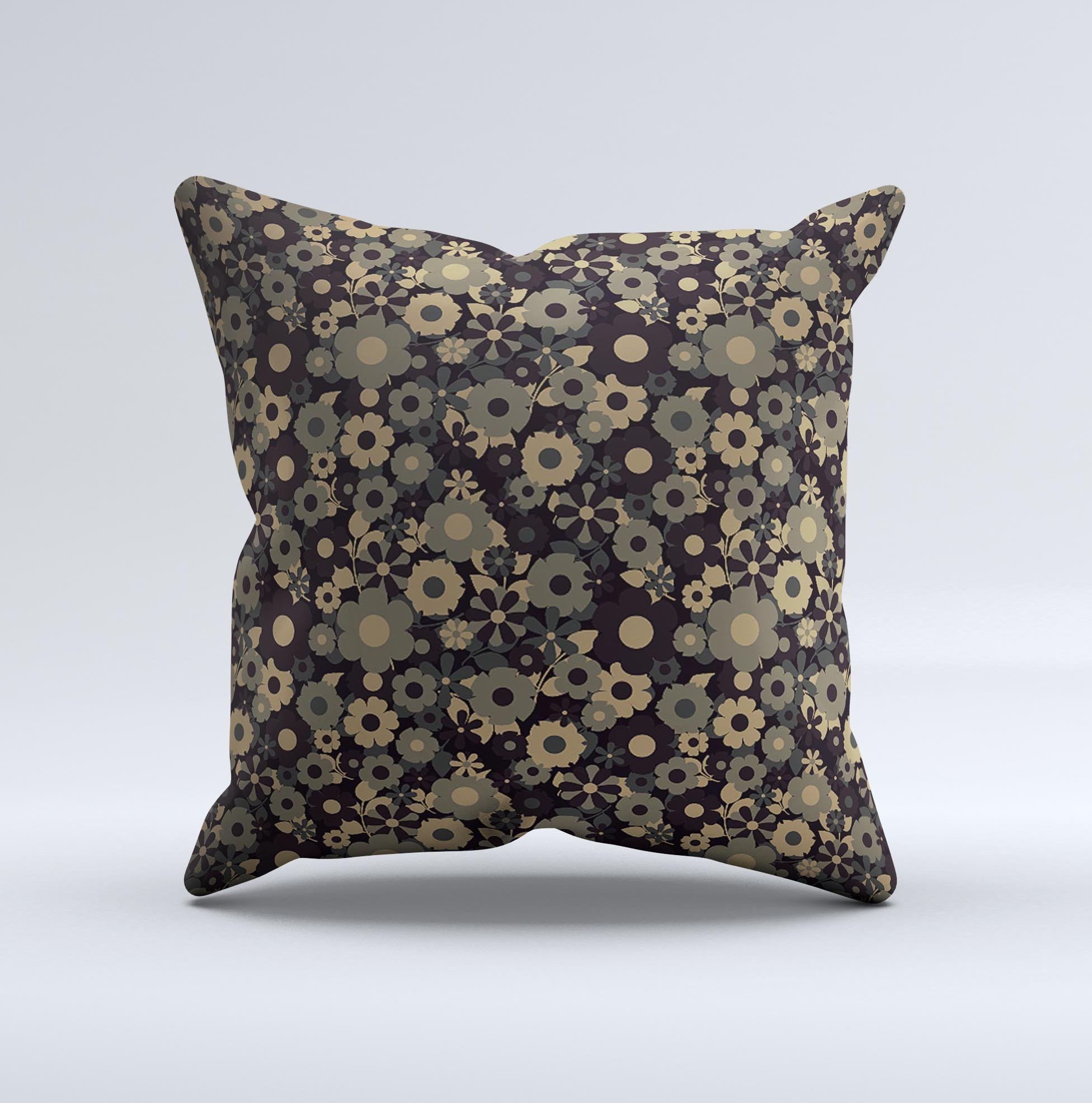 A decorative throw pillow featuring tiny gold floral sprockets on a soft fabric, showcasing its unique handmade quality.