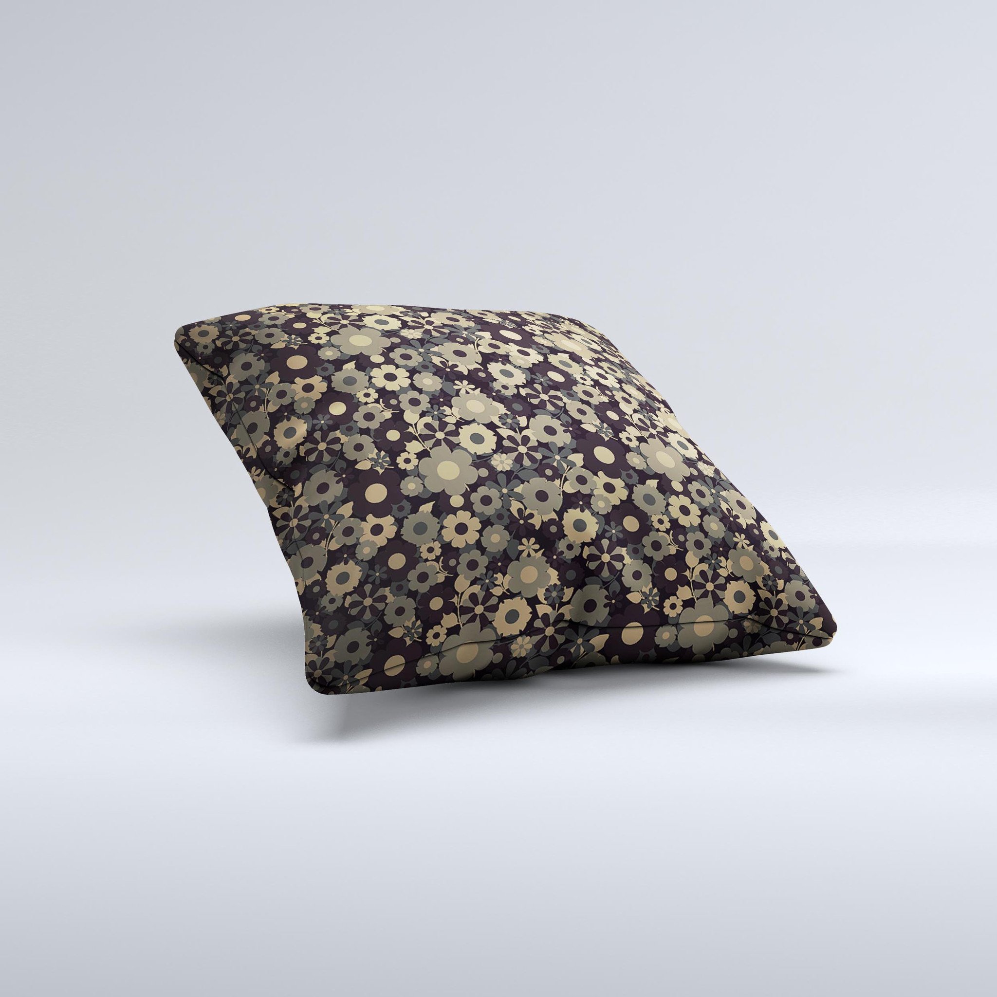 A decorative throw pillow featuring tiny gold floral sprockets on a soft fabric, showcasing its unique handmade quality.