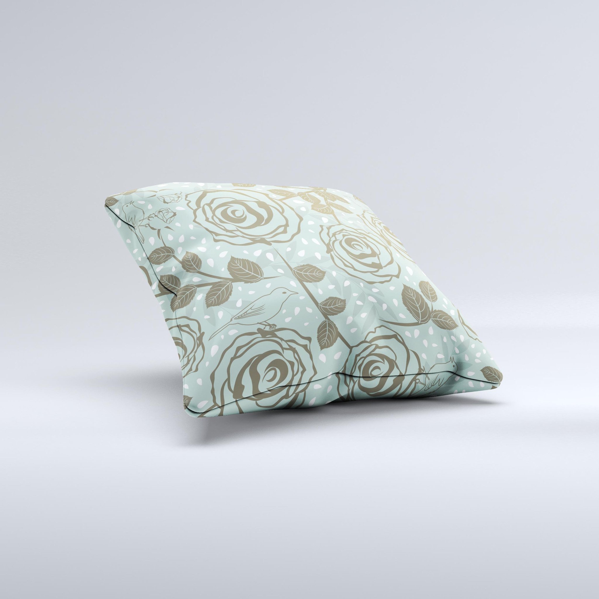 Toned green decorative throw pillow featuring vector roses and birds, showcasing a unique handmade design.