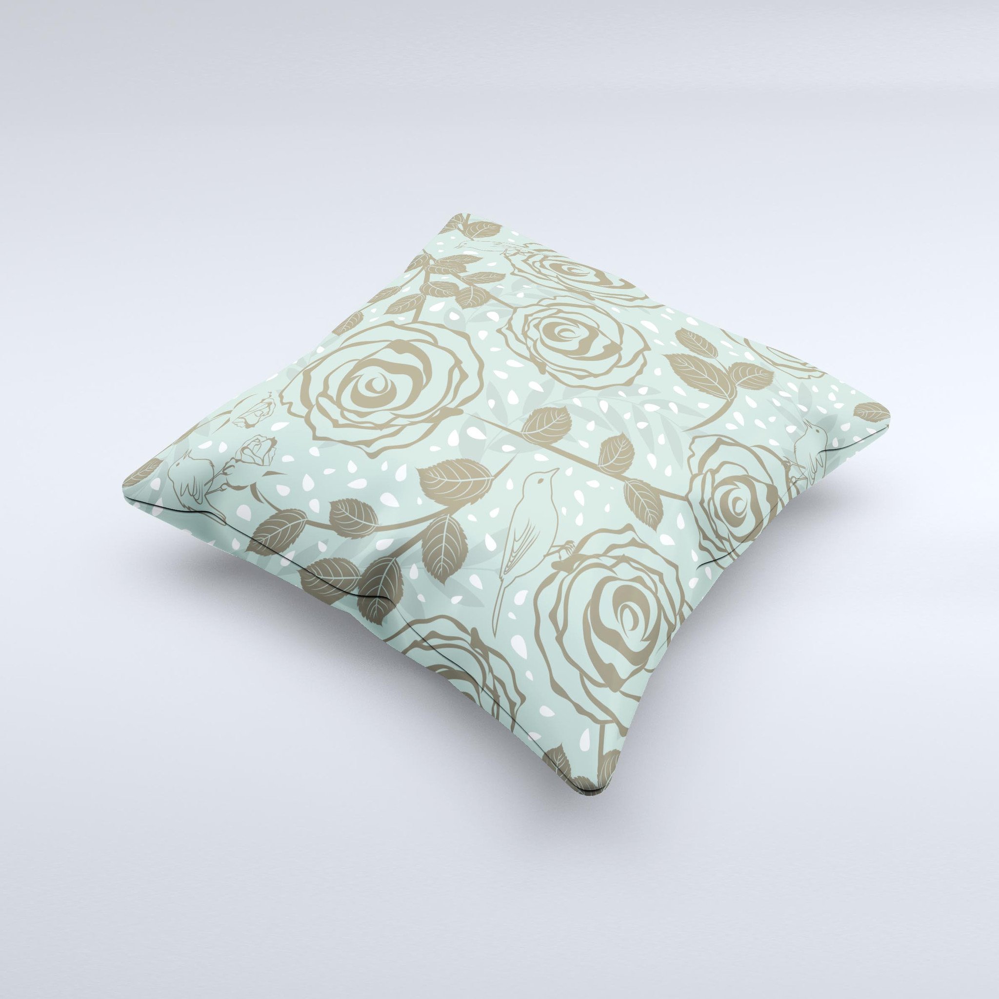 Toned green decorative throw pillow featuring vector roses and birds, showcasing a unique handmade design.