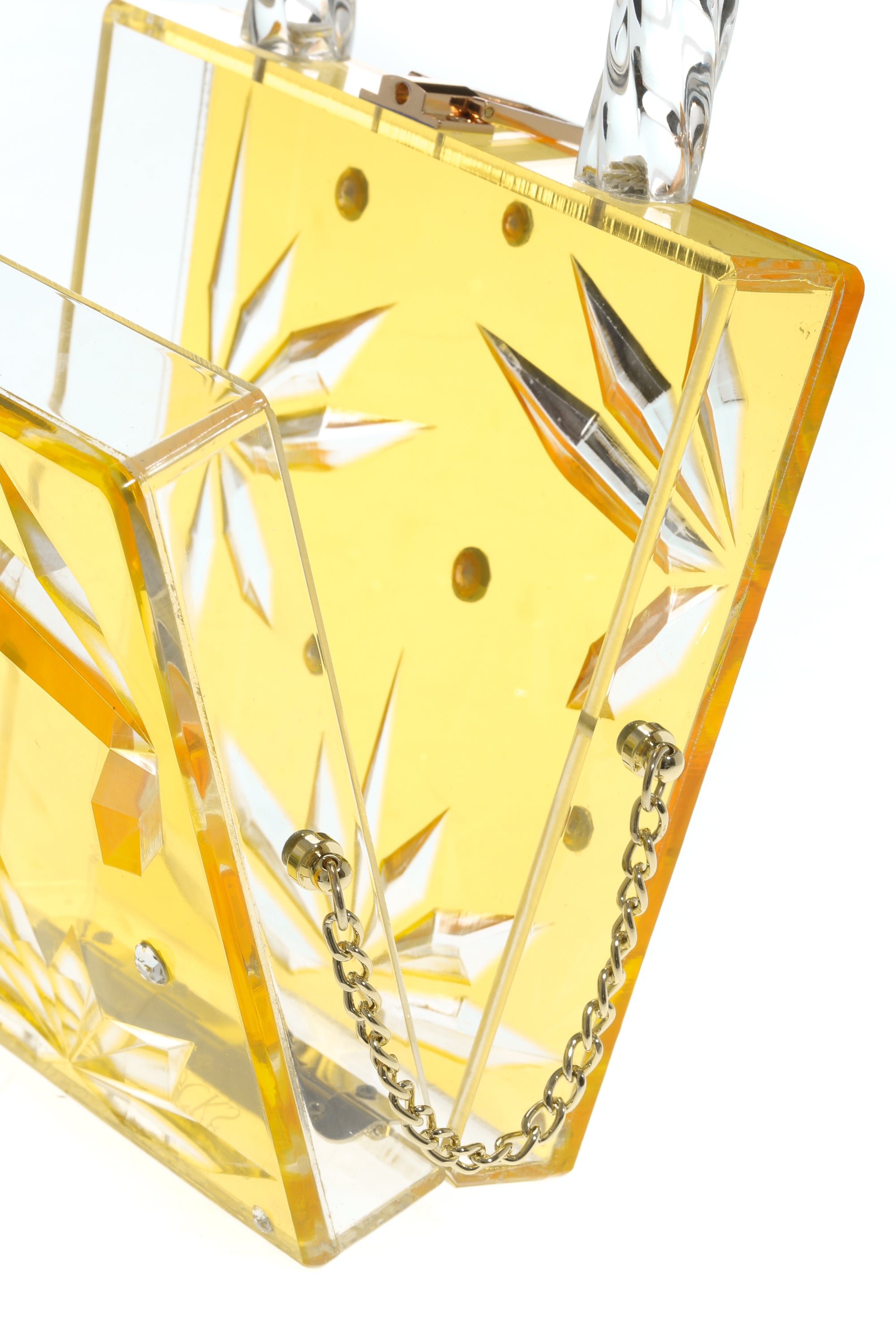 Top Handle Amber Hock Cut to clear Lucite Acrylic Handbag with twisted round handles and goldplate latches, showcasing a crystal-like design.